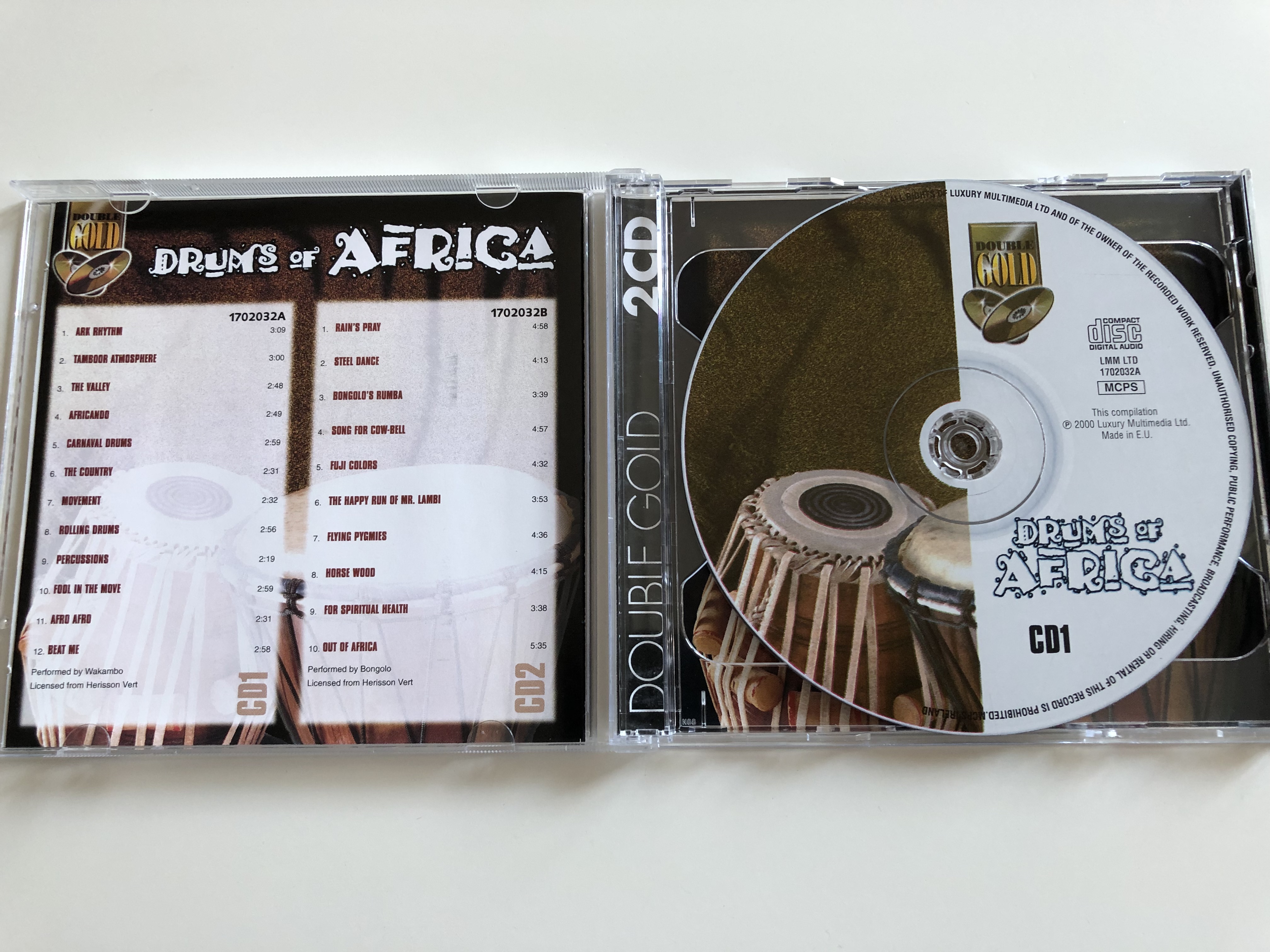 drums-of-africa-ark-rhythm-tamboor-atmosphere-the-valley-africando-carnaval-drums-rain-s-pray-steel-dance-bongolo-s-rumba-fuji-colors-flying-pygmies-lmm-2x-audio-cd-1702032-2-.jpg