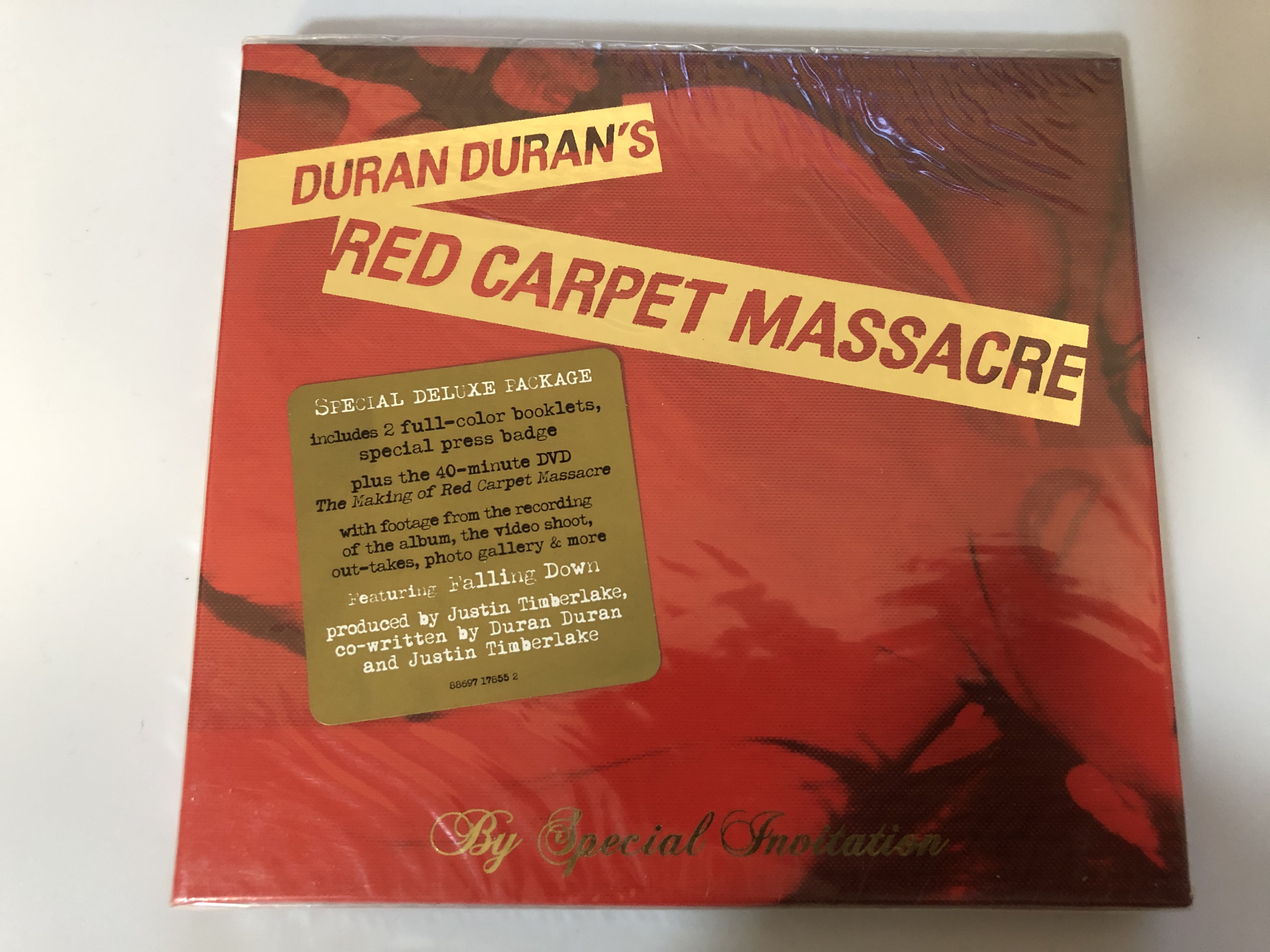 Duran Duran ‎– Red Carpet Massacre / Special Deluxe Package includes 2 full-color special press badge, plus the 40-minute DVD ''The Making Of Red Carpet Massacre'' / Epic ‎Audio CD + DVD CD 2007 / 88697 17855 2 - bibleinmylanguage