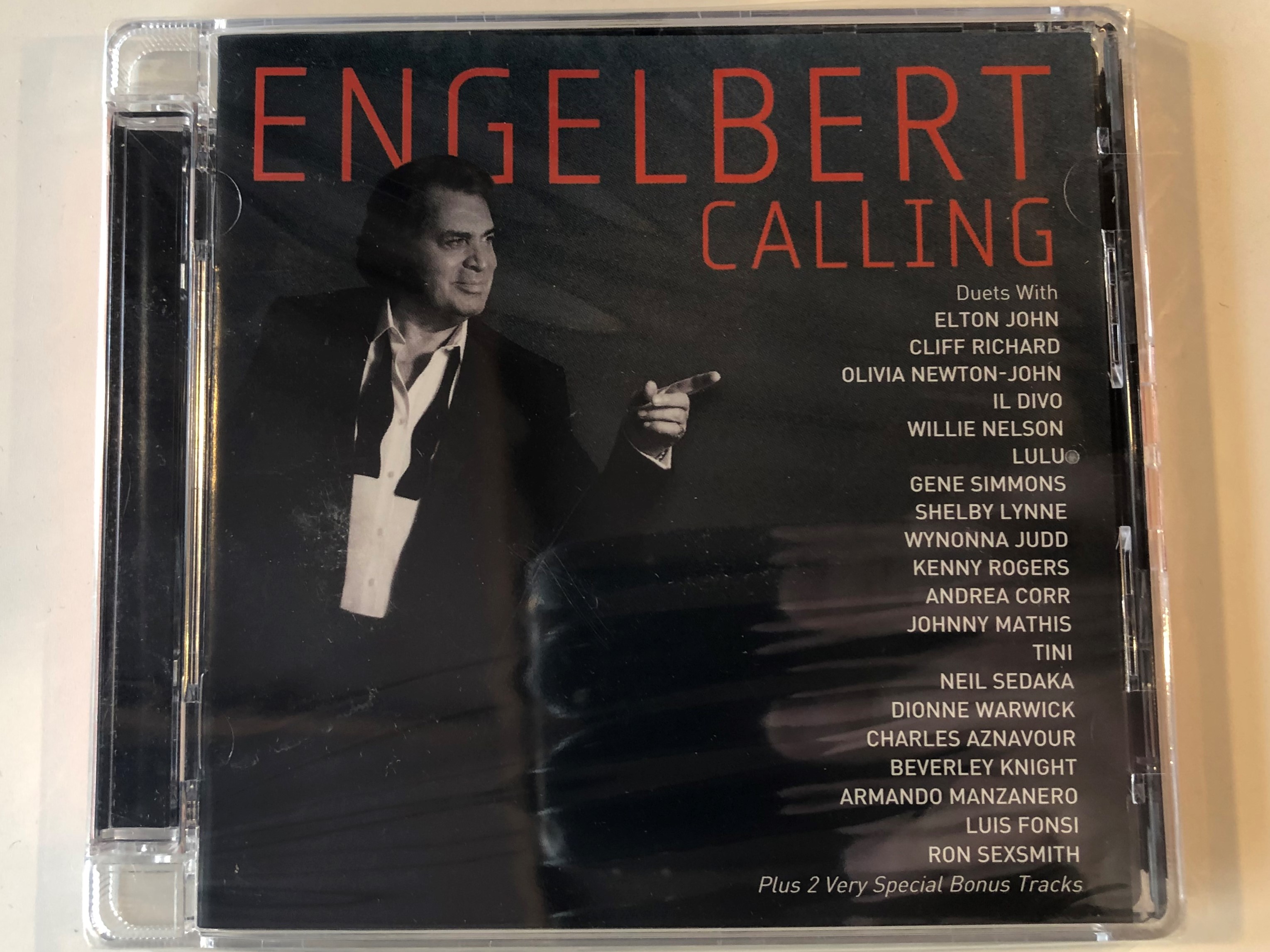 engelbert-calling-duets-with-elton-john-cliff-richard-olivia-newton-john-il-divo-willie-nelson-lulu-gene-simmons-shelby-lynne-wynonna-judd-kenny-rogers-andrea-corr-johnny-mathis-tin-1-.jpg