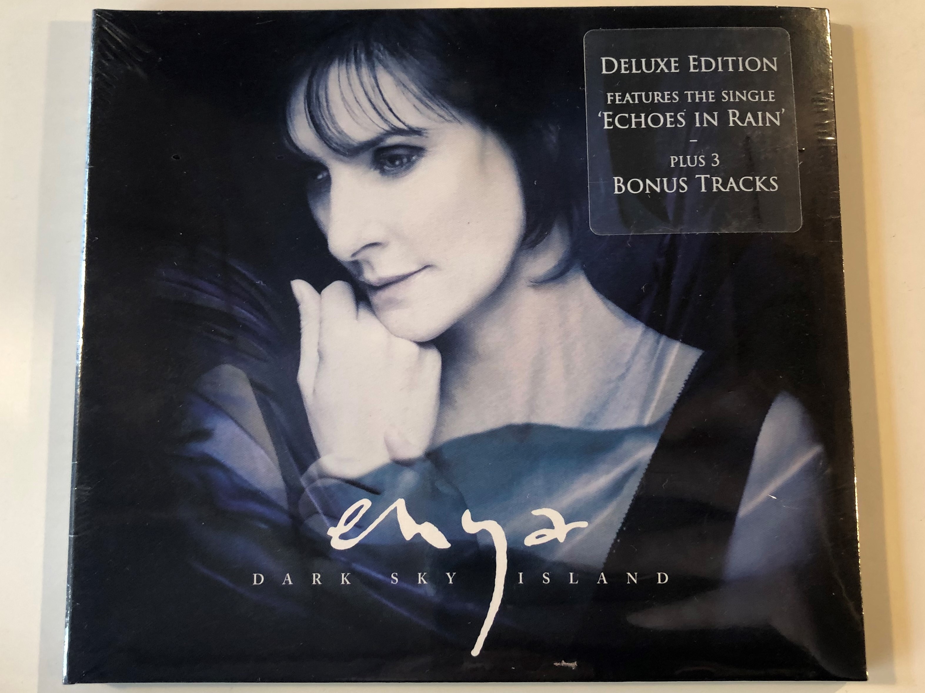 enya-dark-sky-island-deluxe-edition-features-the-single-echoes-in-rain-plus-3-bonus-tracks-warner-bros.-records-audio-cd-2015-0825646994441-1-.jpg