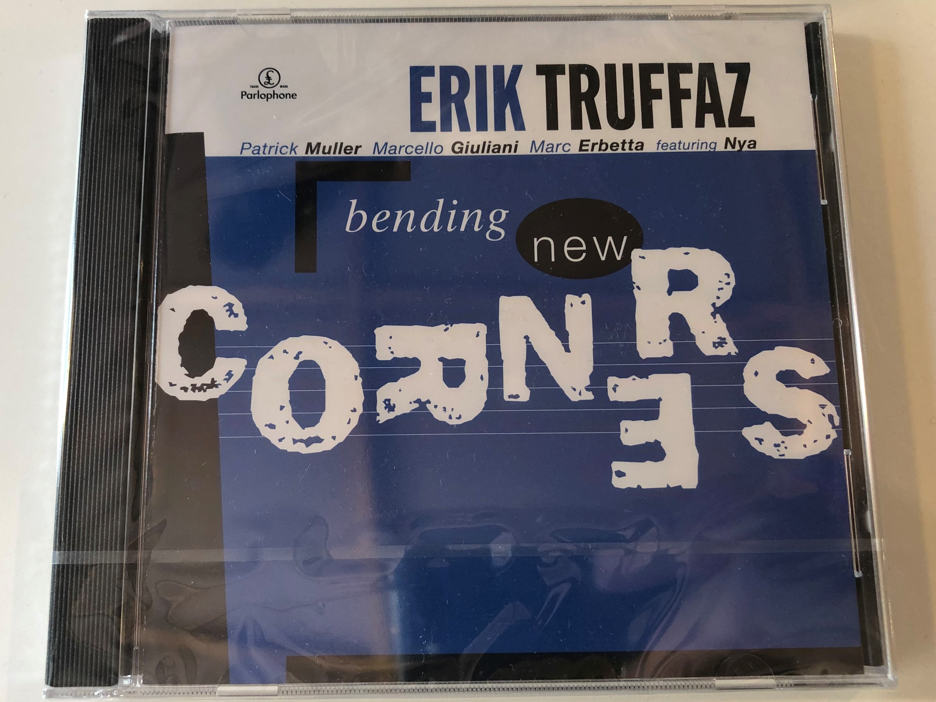 erik-truffaz-patrick-muller-marcello-giuliani-marc-erbetta-featuring-nya-bending-new-corners-parlophone-audio-cd-1999-5099994886023-1-.jpg