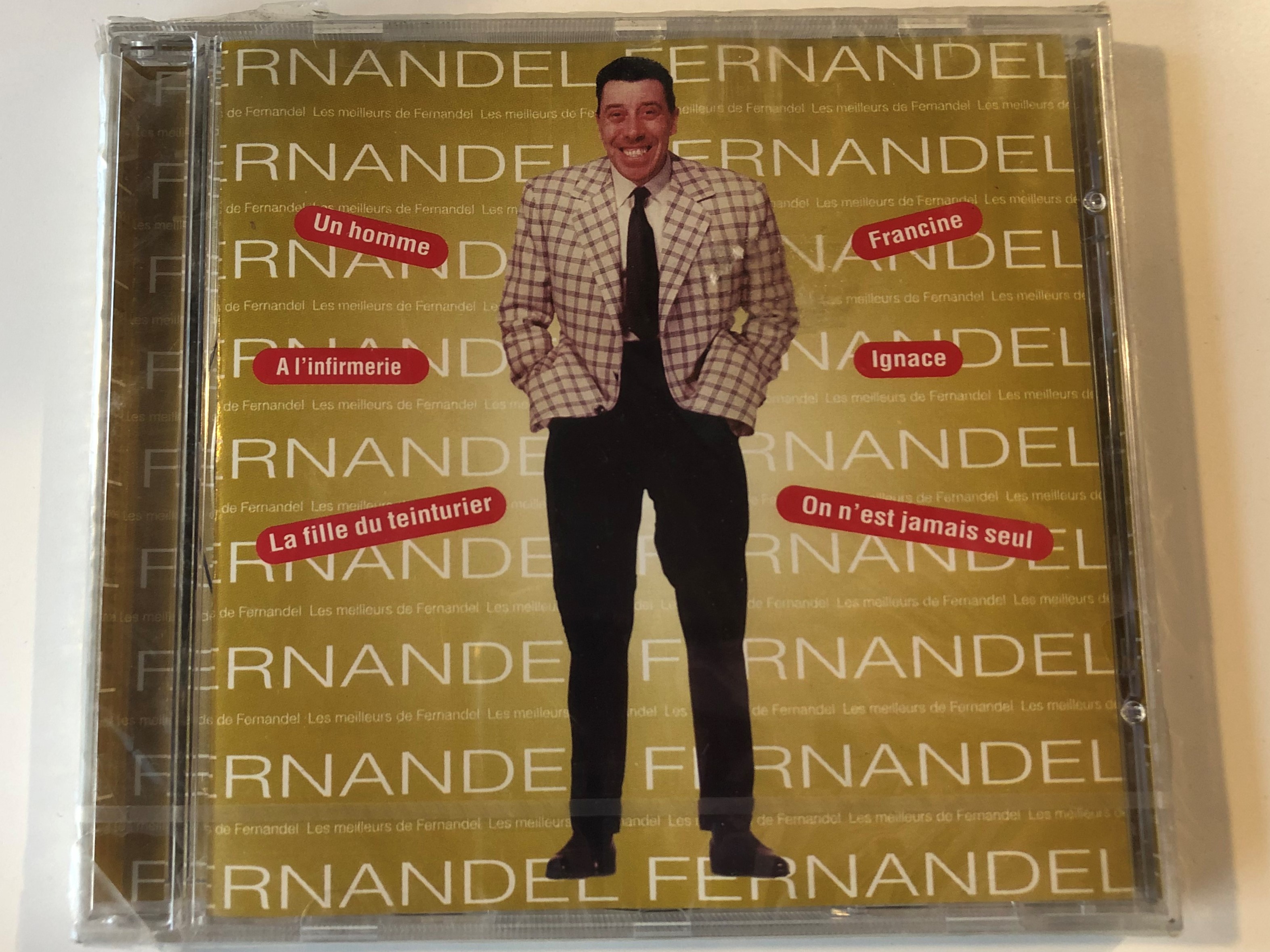 fernandel-les-meilleurs-de-fernandel-un-homme-francine-a-l-infirmerie-ignace-la-fille-du-teinturier-on-n-est-jamais-seul-disky-audio-cd-1998-fdc-883752-1-.jpg