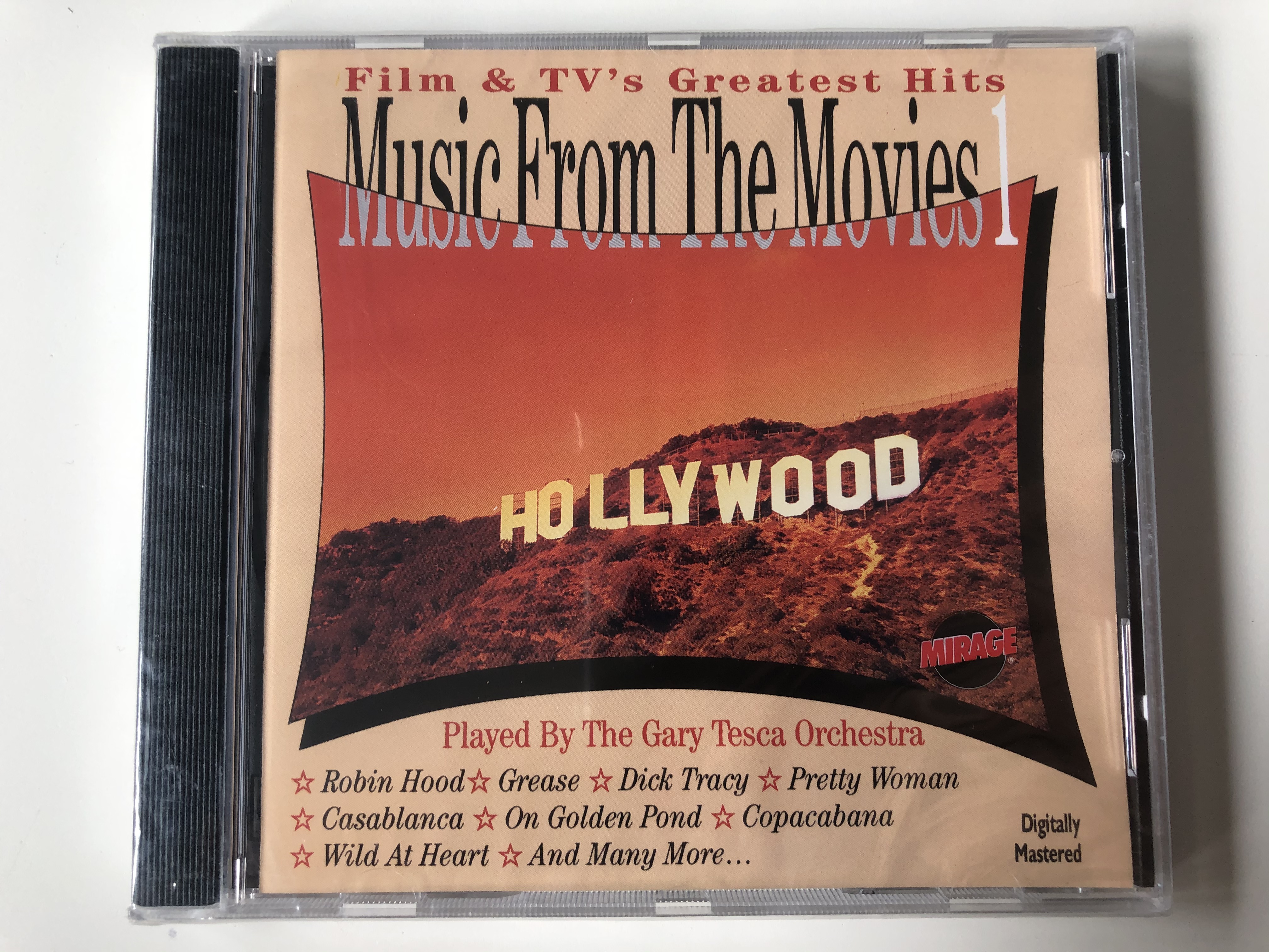 film-tv-s-greatest-hits-music-from-the-movies-1-played-by-the-gary-tesca-orchestra-robin-hood-grease-dick-tracy-pretty-woman-casablanca-on-golden-pond-copacabana-wild-at-heart-...-m-1-.jpg