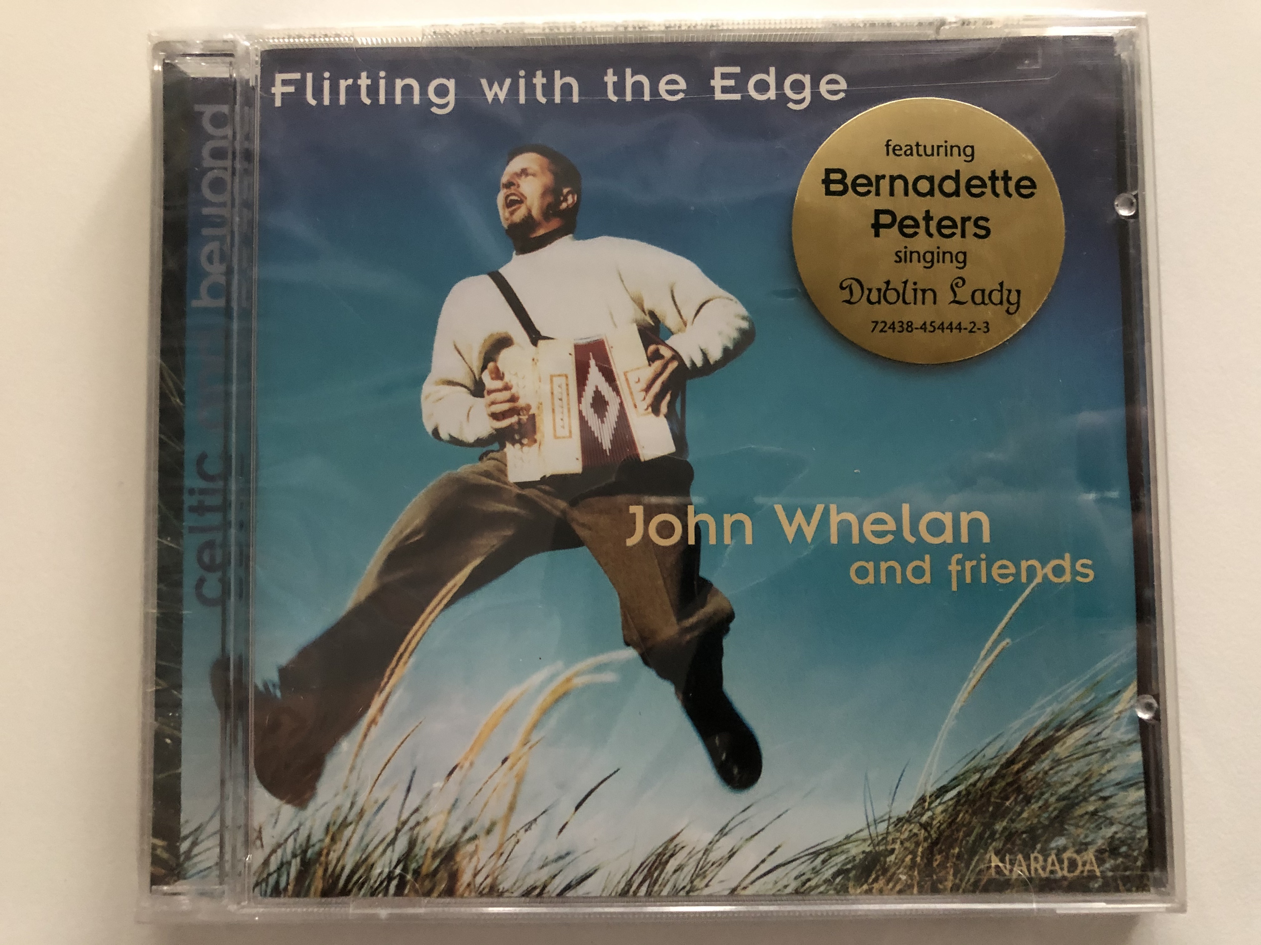 flirting-with-the-edge-john-whelan-and-friends-featuring-bernadette-peters-singing-dublin-lady-narada-audio-cd-1998-72438-45444-2-3-1-.jpg