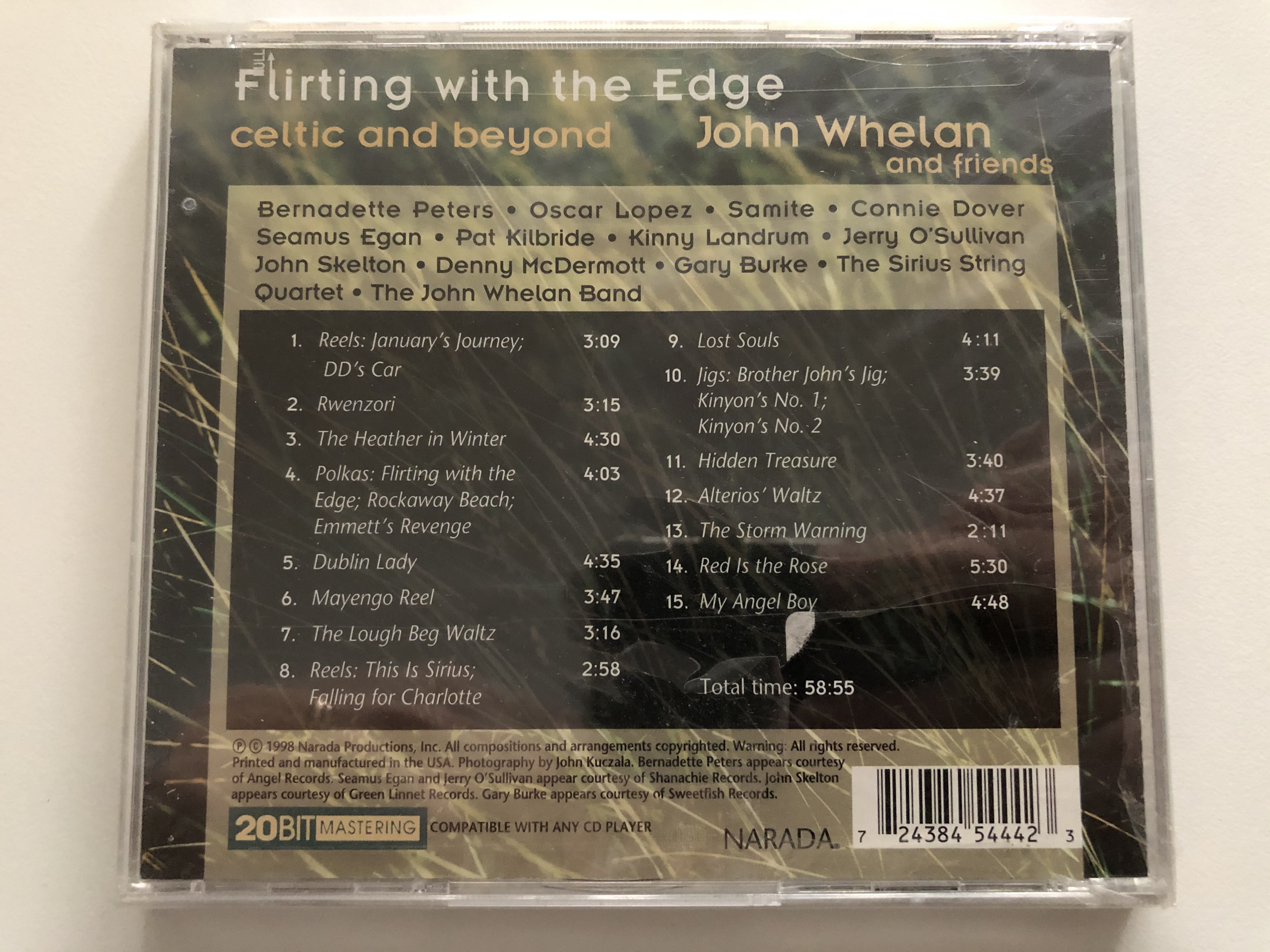 flirting-with-the-edge-john-whelan-and-friends-featuring-bernadette-peters-singing-dublin-lady-narada-audio-cd-1998-72438-45444-2-3-2-.jpg