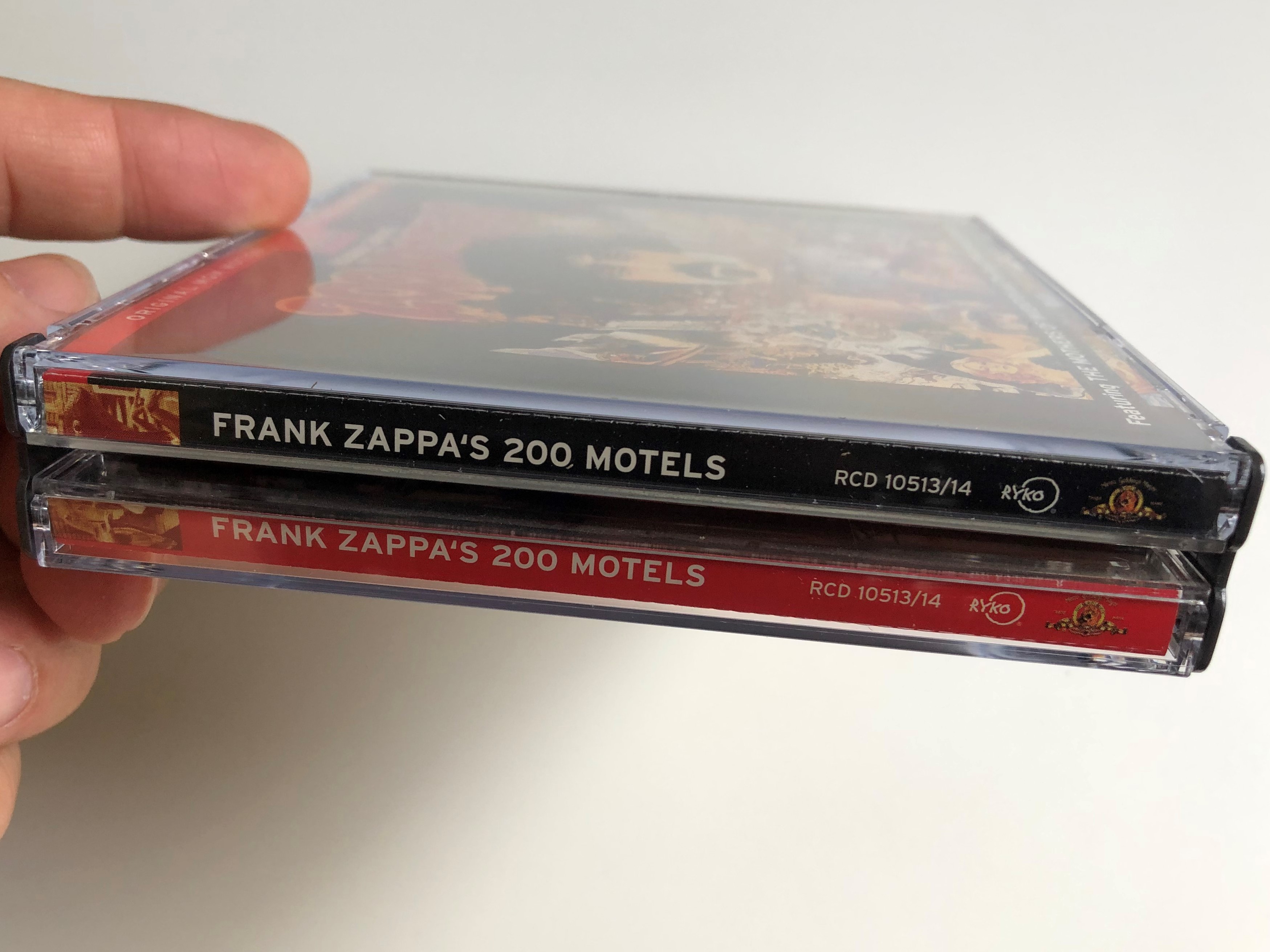 frank-zappa-200-motels-original-mgm-motion-picture-soundtrack-featuring-the-mothers-of-invention-and-the-royal-philharmonic-orchestra-rykodisc-2x-audio-cd-1997-rcd-1051314-2-.jpg