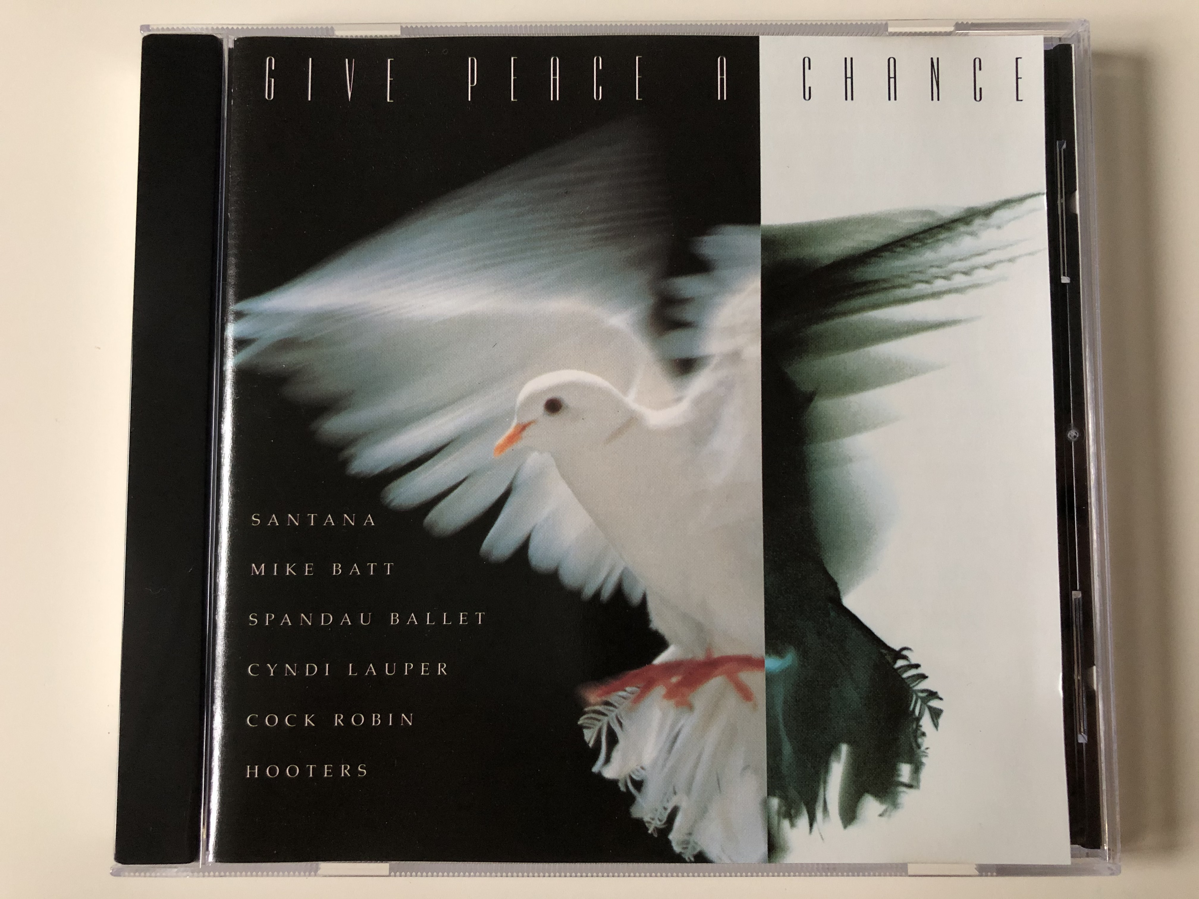 give-peace-a-chance-santana-mike-batt-spandau-ballet-cyndi-lauper-cock-robin-hooters-columbia-audio-cd-1993-col-474326-2-1-.jpg