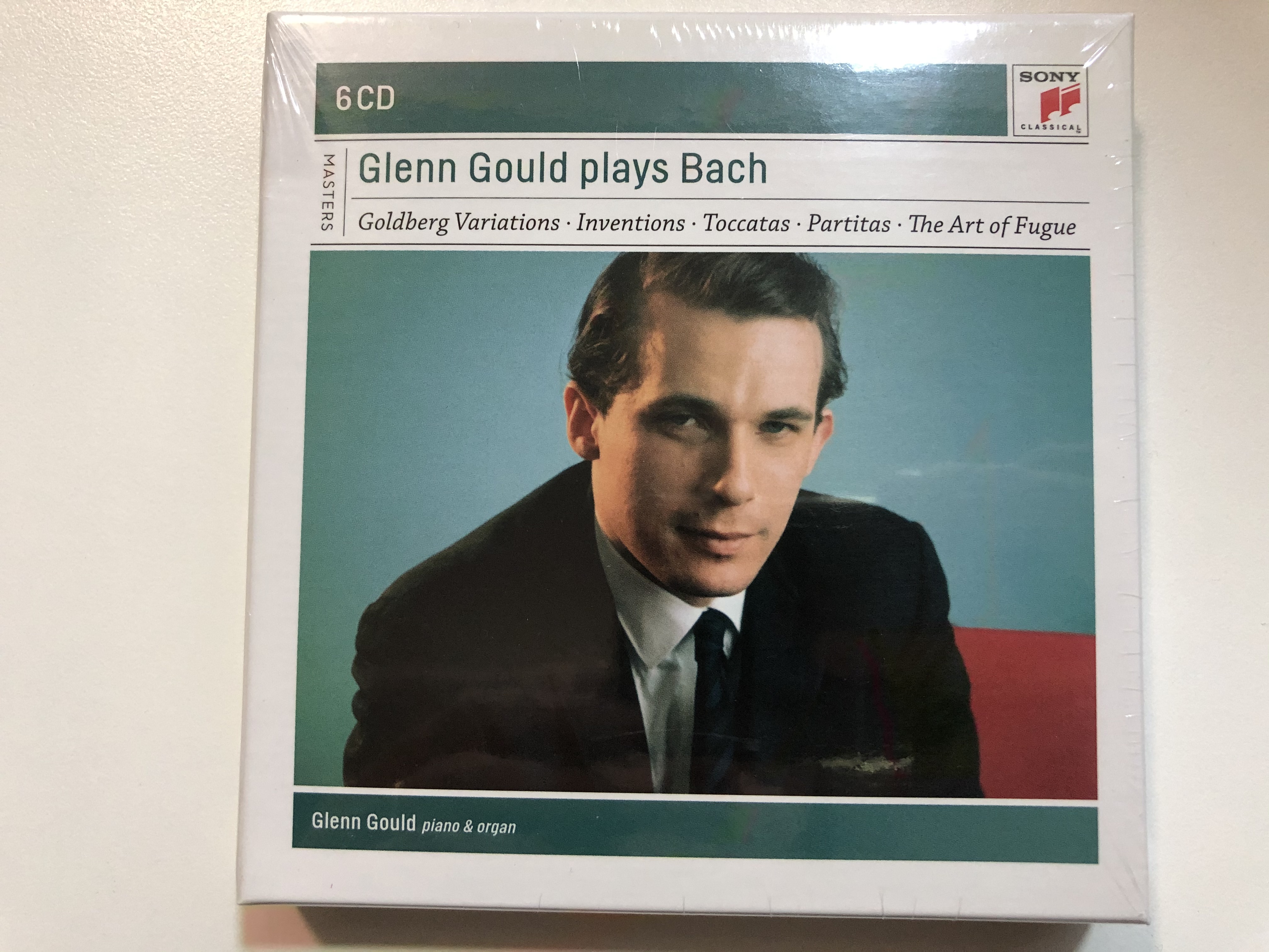 glenn-gould-plays-bach-goldberg-variations-inventions-toccatas-partitas-the-art-of-fugue-glenn-gould-piano-organ-sony-classical-6x-audio-cd-2011-stereo-mono-88697683932-1-.jpg
