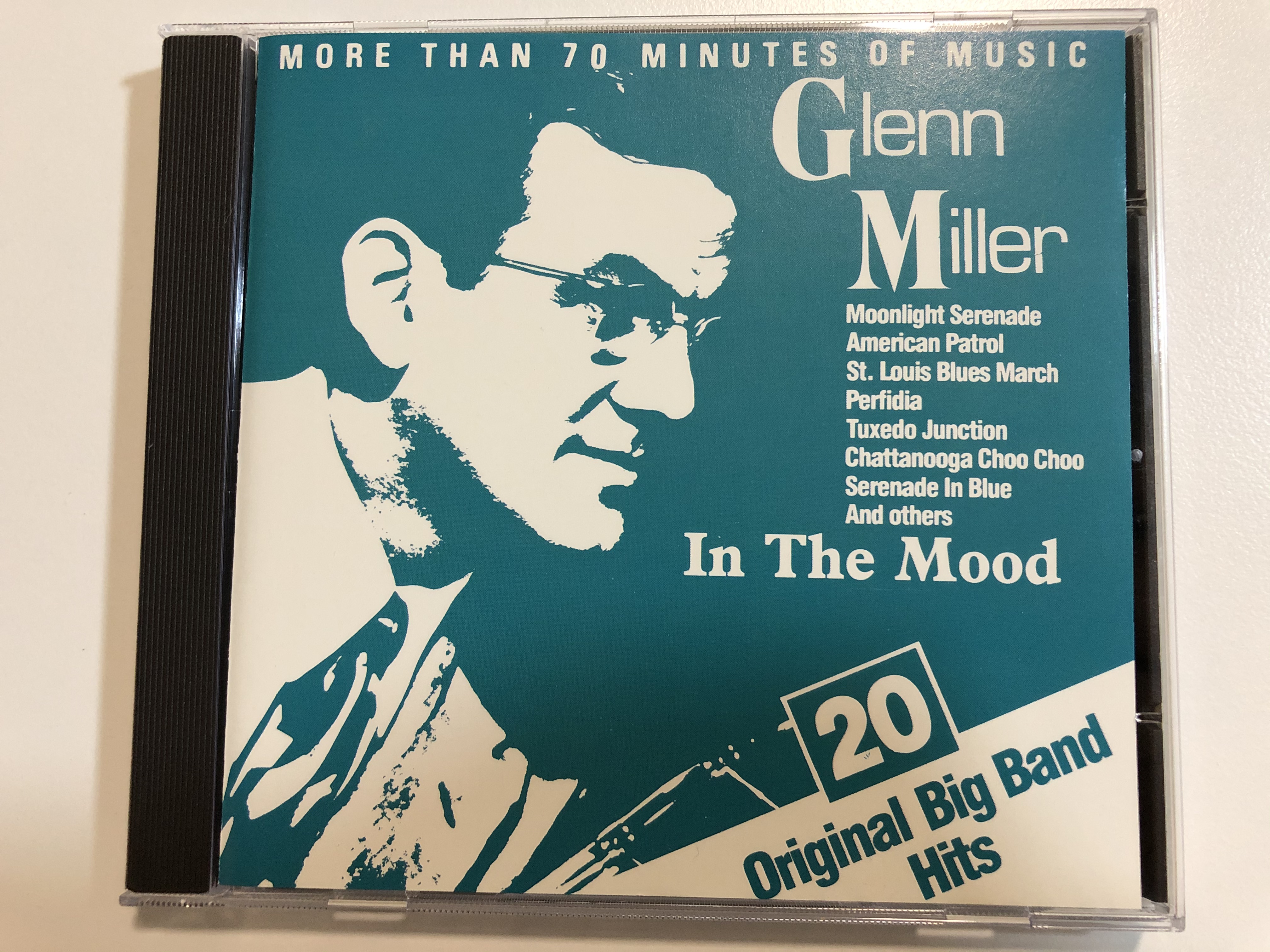 glenn-miller-in-the-mood-20-original-big-band-hits-moonlight-serenade-american-patrol-st.-louis-blues-march-perfidia-tuxedo-junction-chattanooga-choo-choo-serenade-in-blue-and-o-1-.jpg