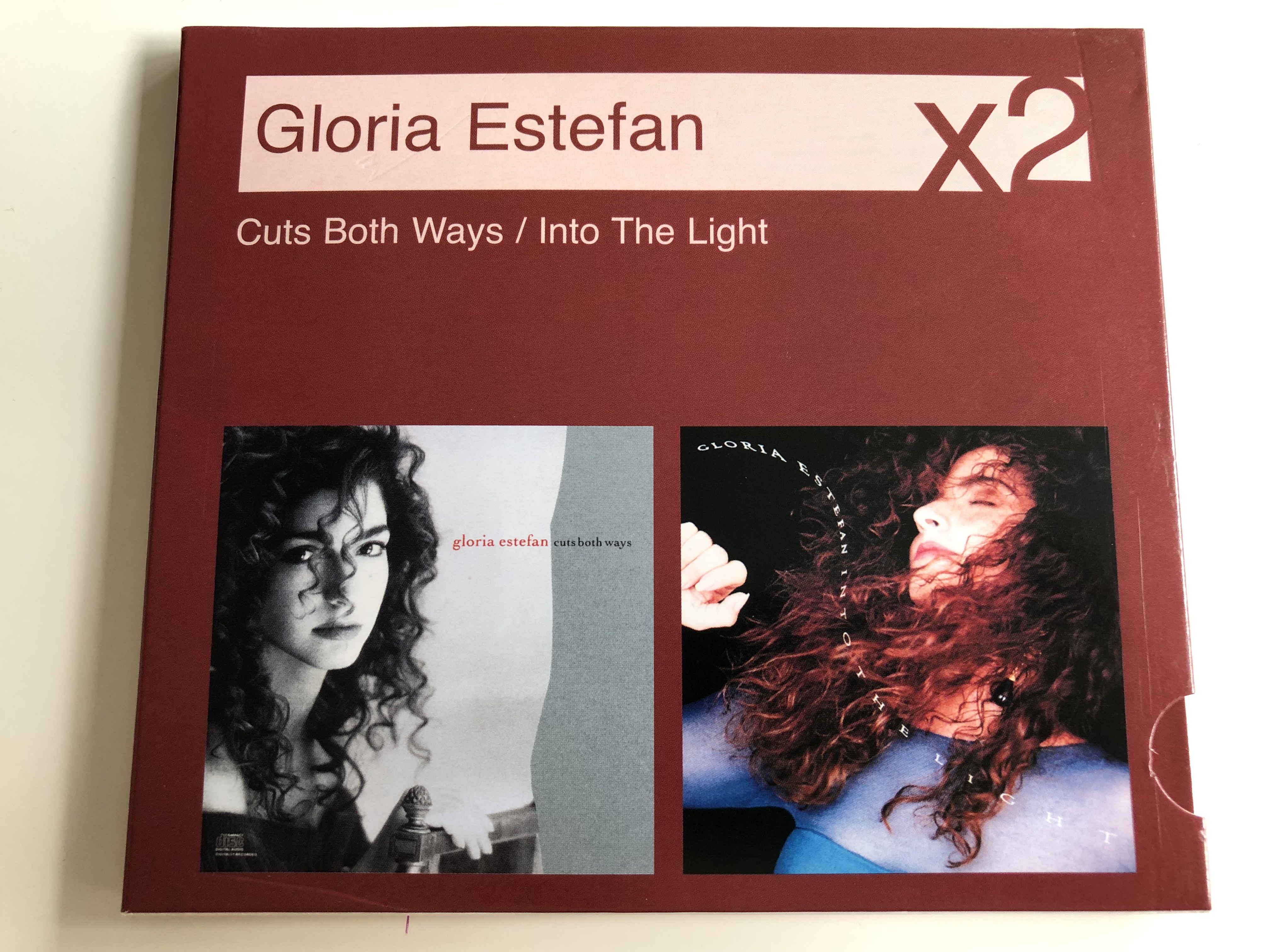 gloria-estefan-x2-cuts-both-ways-into-the-light-audio-cd-2007-here-we-are-nothin-new-get-on-your-feet-si-voy-a-perderte-seal-our-fate-close-my-eyes-light-of-love-2-cd-sony-bmg-1-.jpg