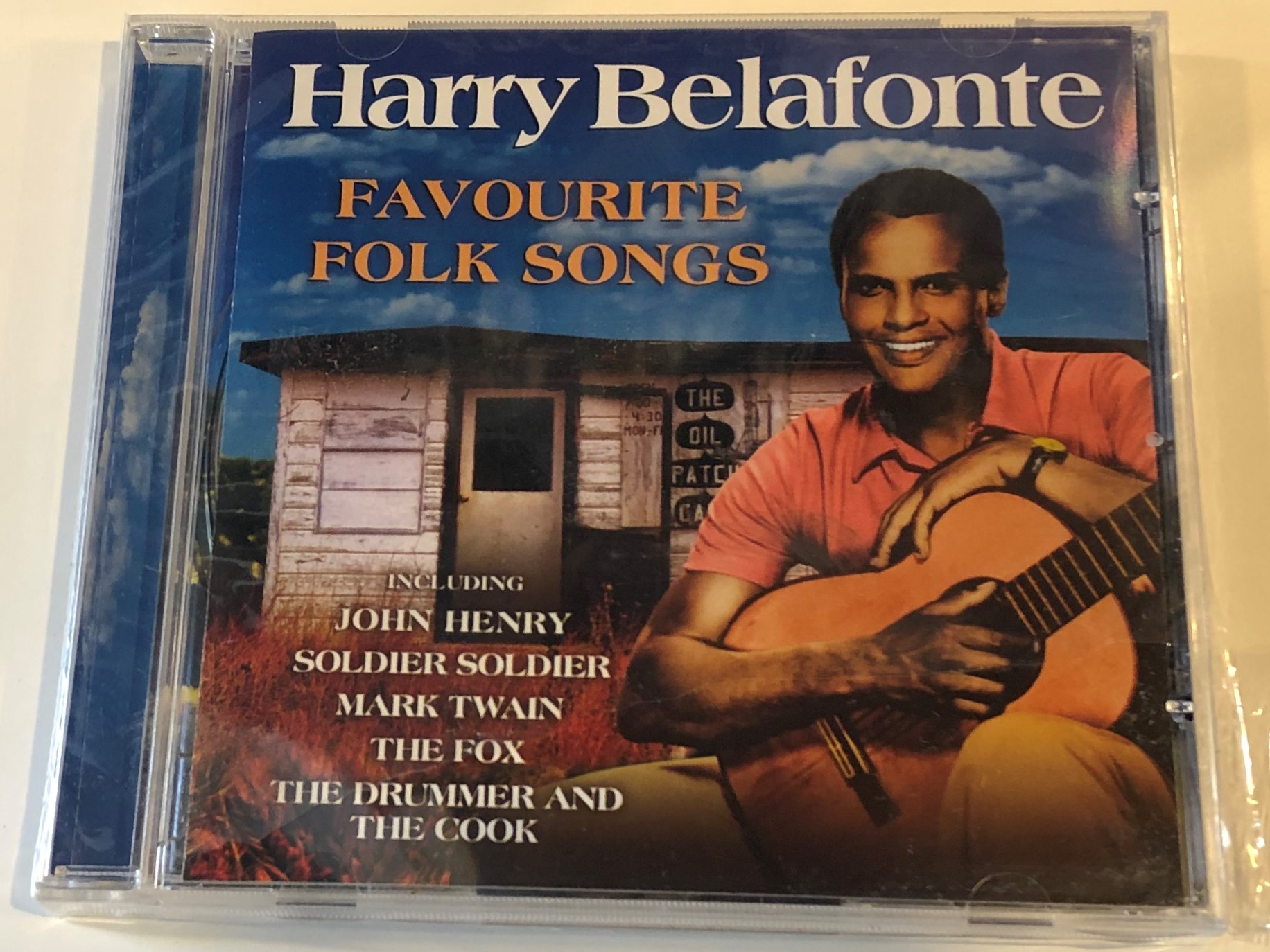 harry-belafonte-favorite-folk-songs-including-john-henry-soldier-soldier-mark-twain-the-fox-the-drummer-and-the-cook-prism-leisure-audio-cd-2004-platcd-1322-1-.jpg