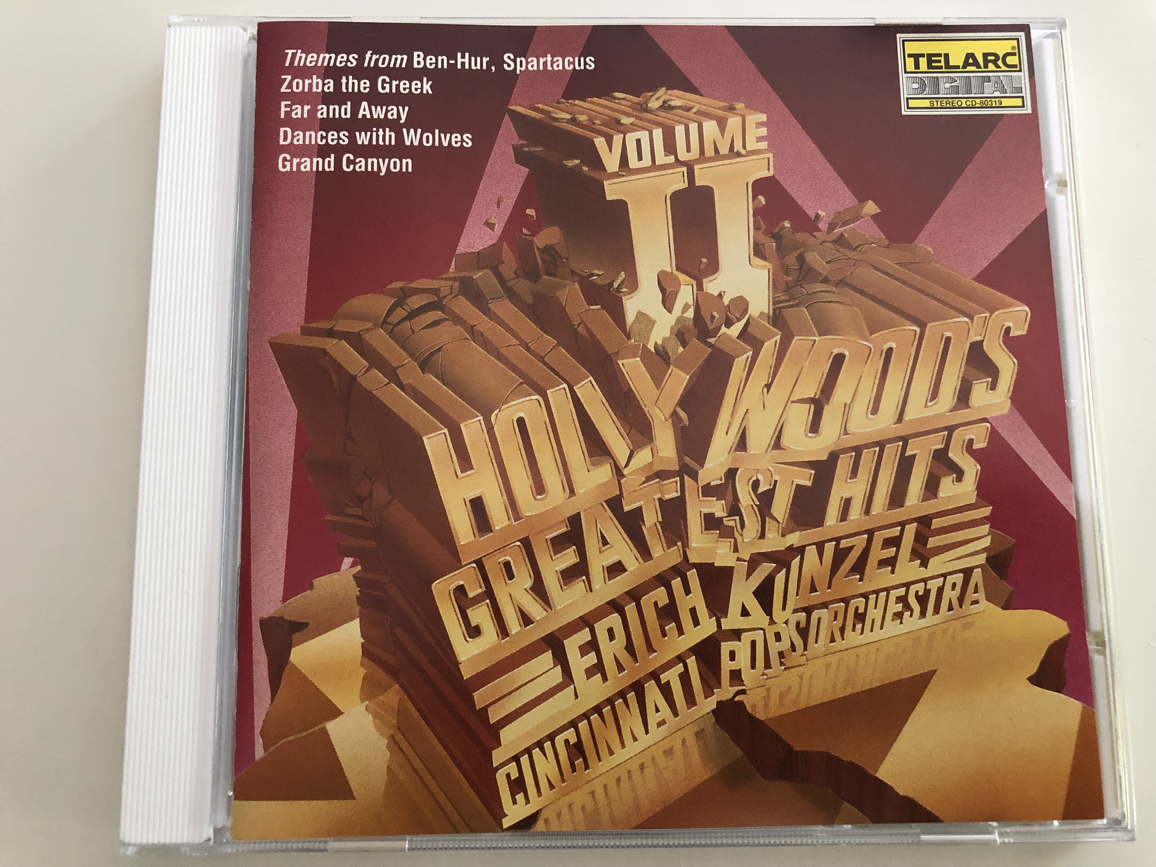 hollywood-s-greatest-hits-volume-2-themes-from-ben-hur-spartacus-zorba-the-greek-far-and-anway-dances-with-wolves-grand-canyon-cincinnati-pops-orchestra-conducted-by-erich-kunzel-telarc-cd-80319-audio-cd-1993-1-.jpg