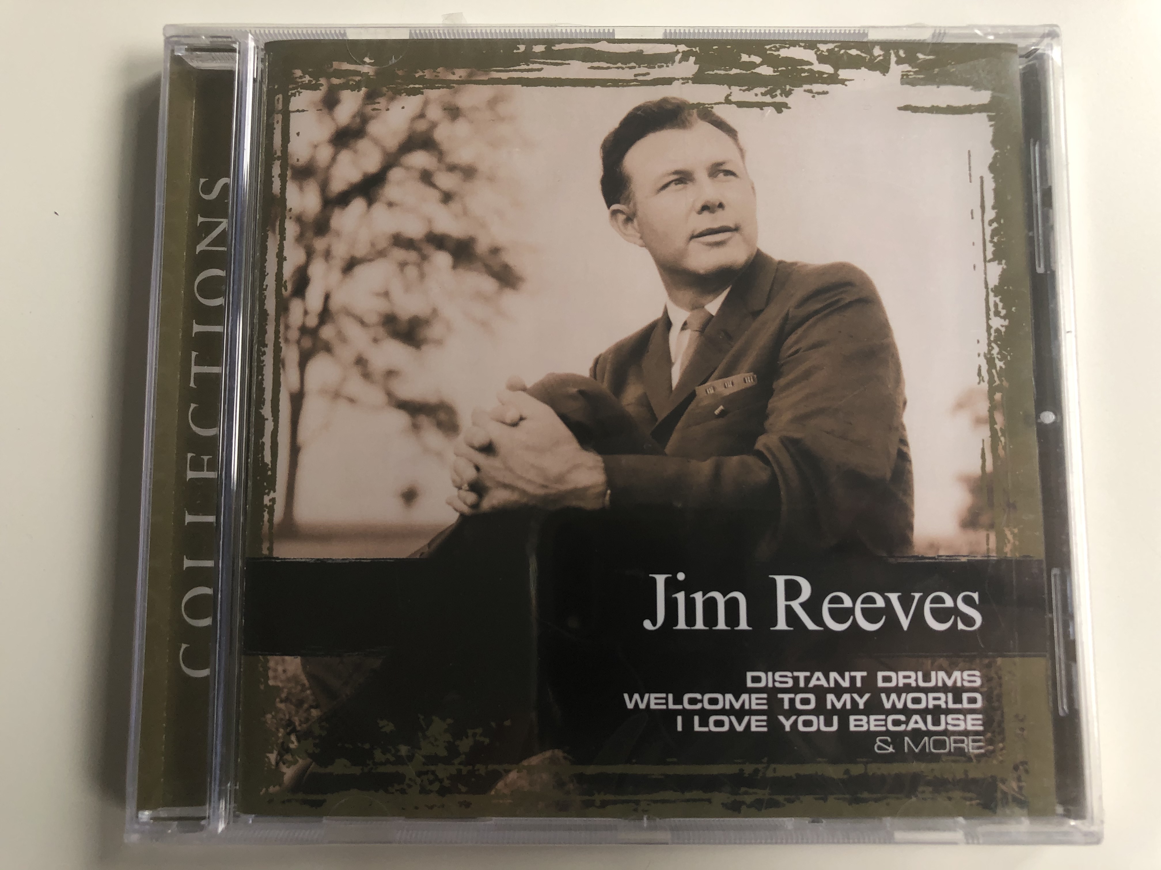 jim-reeves-collections-distant-drums-welcome-to-my-world-i-love-you-because-more-sony-bmg-music-entertainment-audio-cd-2008-88697266162-1-.jpg