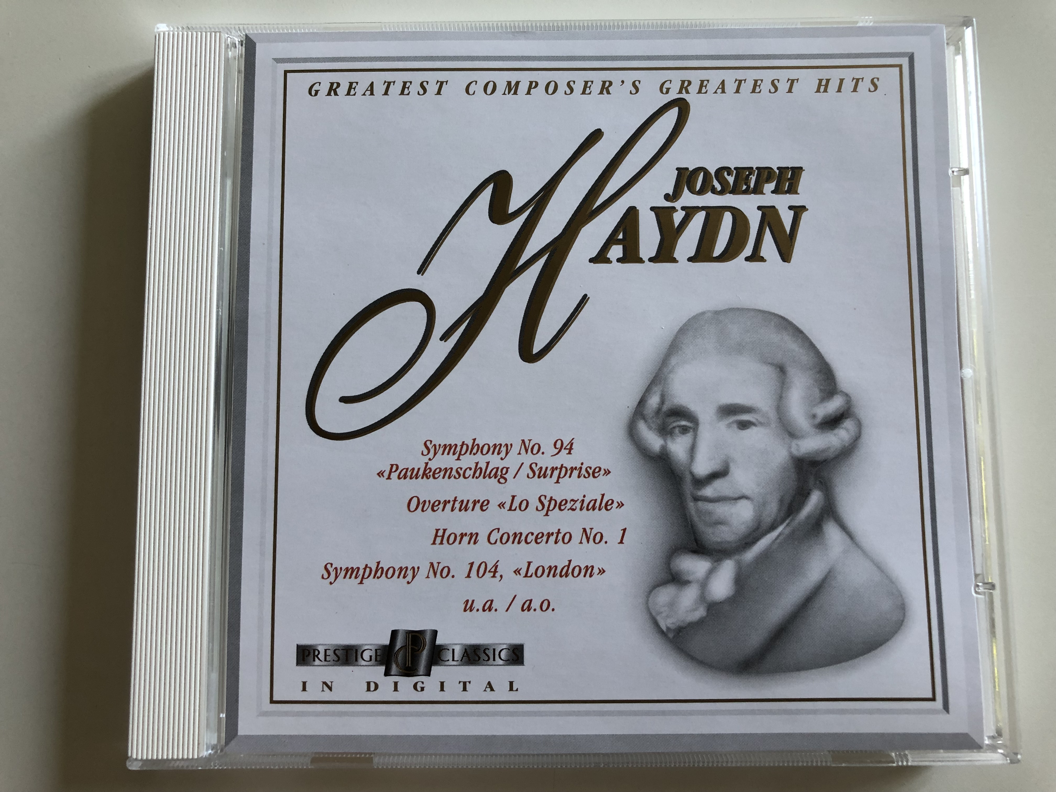 joseph-haydn-greatest-composer-s-greatest-hits-symphony-no.-94-paukenschlag-surprise-overture-lo-speziale-horn-concerto-no.-1-symphony-no.-104-london-audio-cd-1994-prestige-classics-1919.2022-2-1-.jpg
