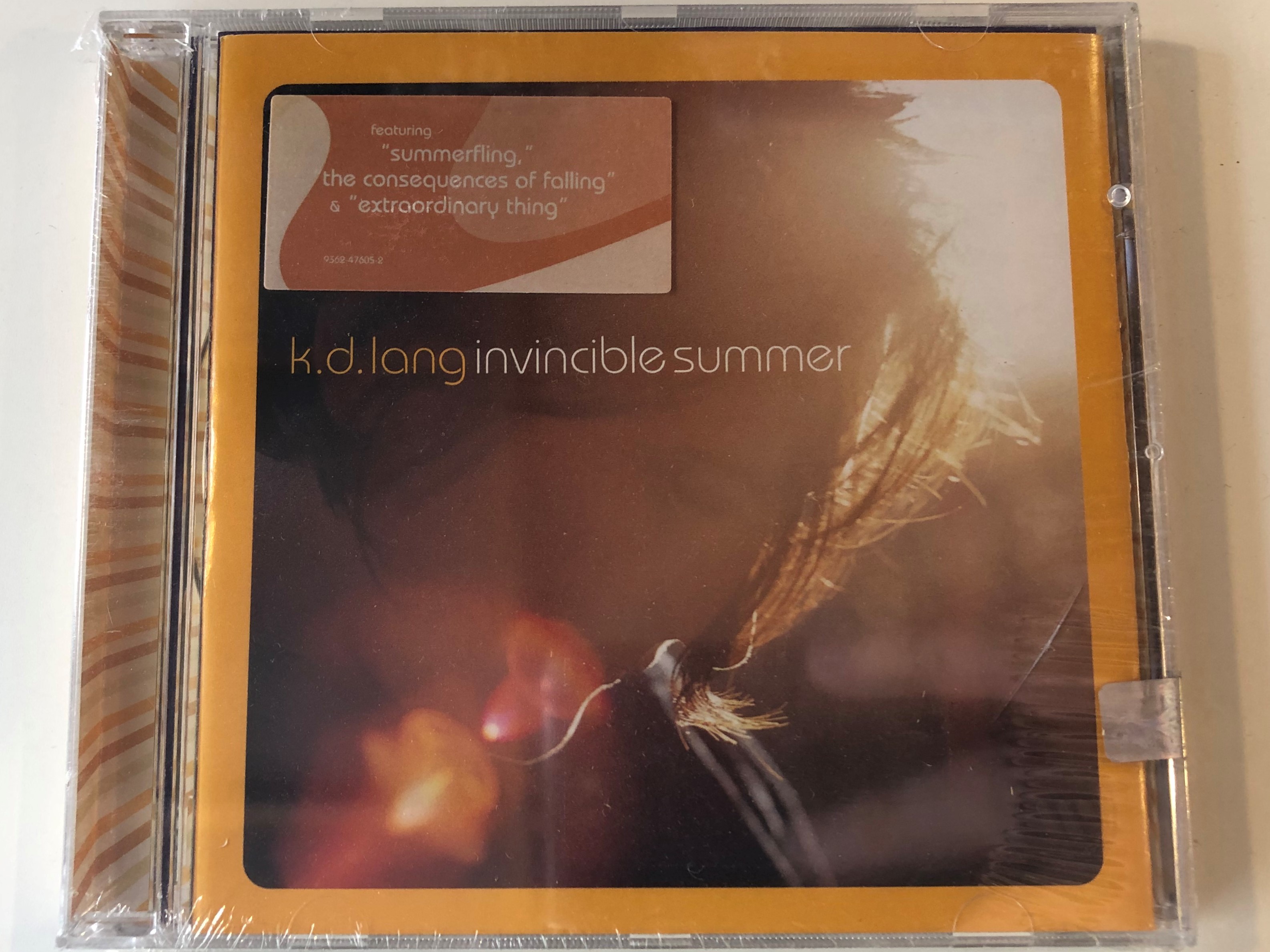 k.d.-lang-invincible-summer-featuring-summerfling-the-consequences-of-falling-extraordinary-thing-warner-bros.-records-audio-cd-2000-9362-47605-2-1-.jpg