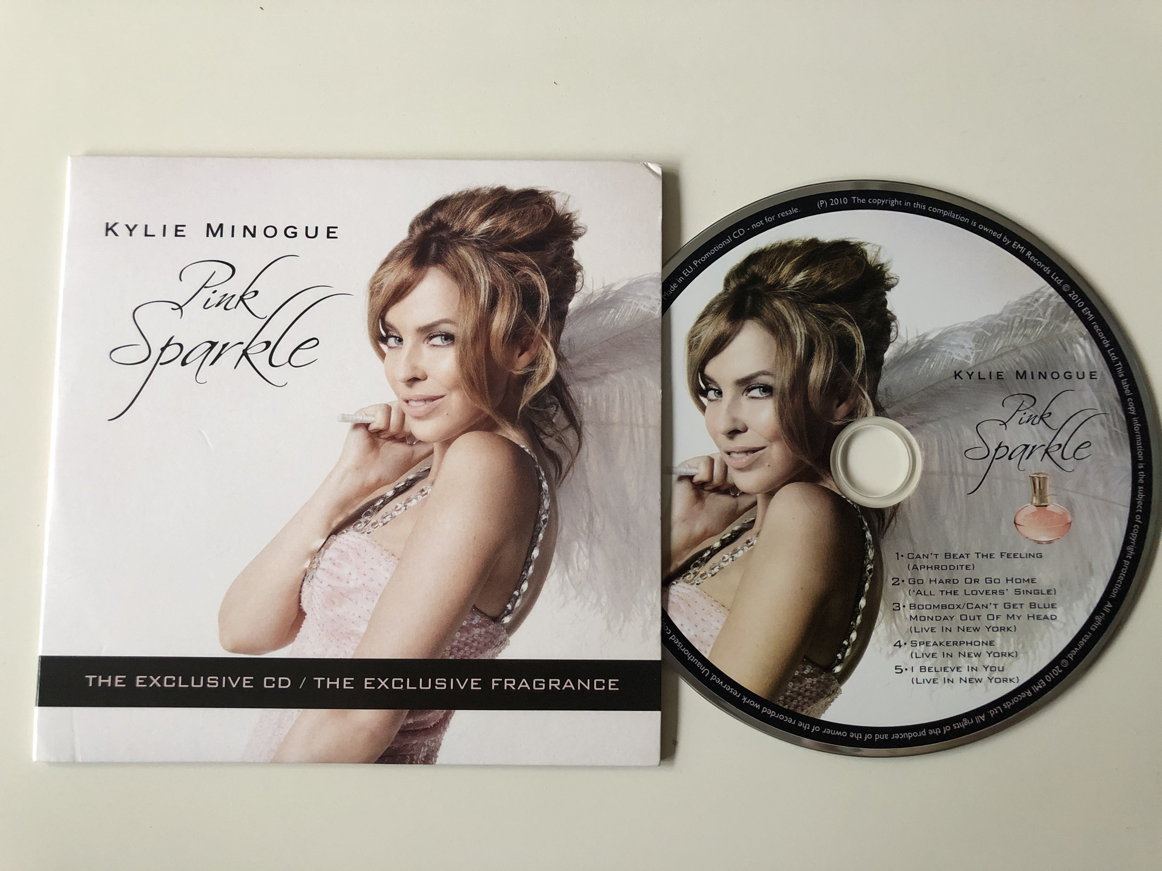 kylie-minogue-pink-sparkle-the-exclusive-cd-the-exclusive-fragrance-parlophone-audio-cd-2010-3607345564722-2-.jpg