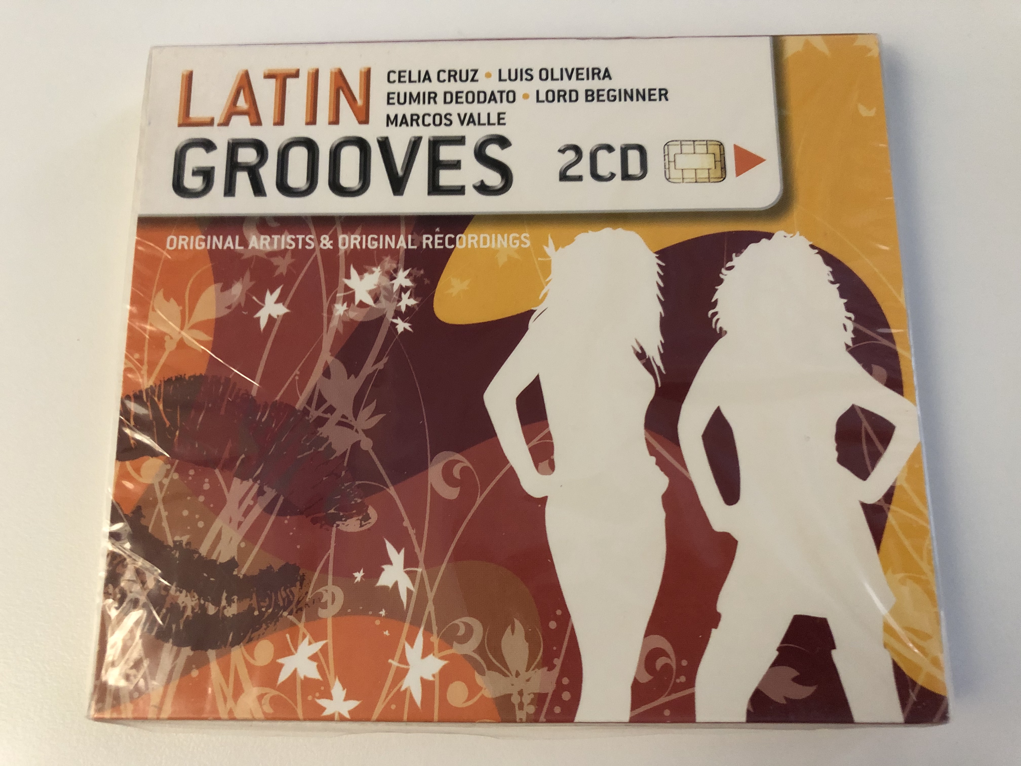 latin-grooves-celia-cruz-luis-oliveira-eumir-deodato-lord-beginner-marcos-valle-disky-2x-audio-cd-2006-do-903821-1-.jpg