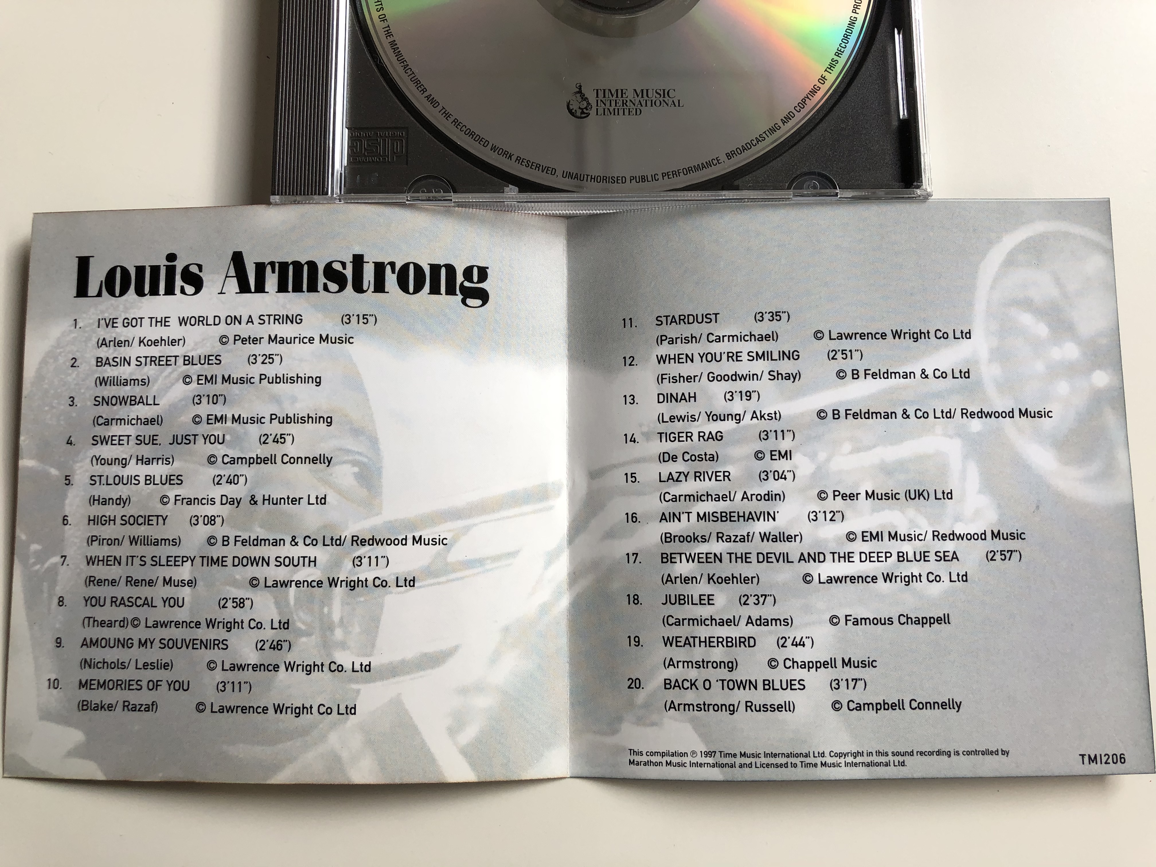 louis-armstrong-featuring-i-ve-got-the-world-on-a-string-basin-street-blues-st-louis-blues-time-music-international-limited-audio-cd-1997-tmi206-2-.jpg