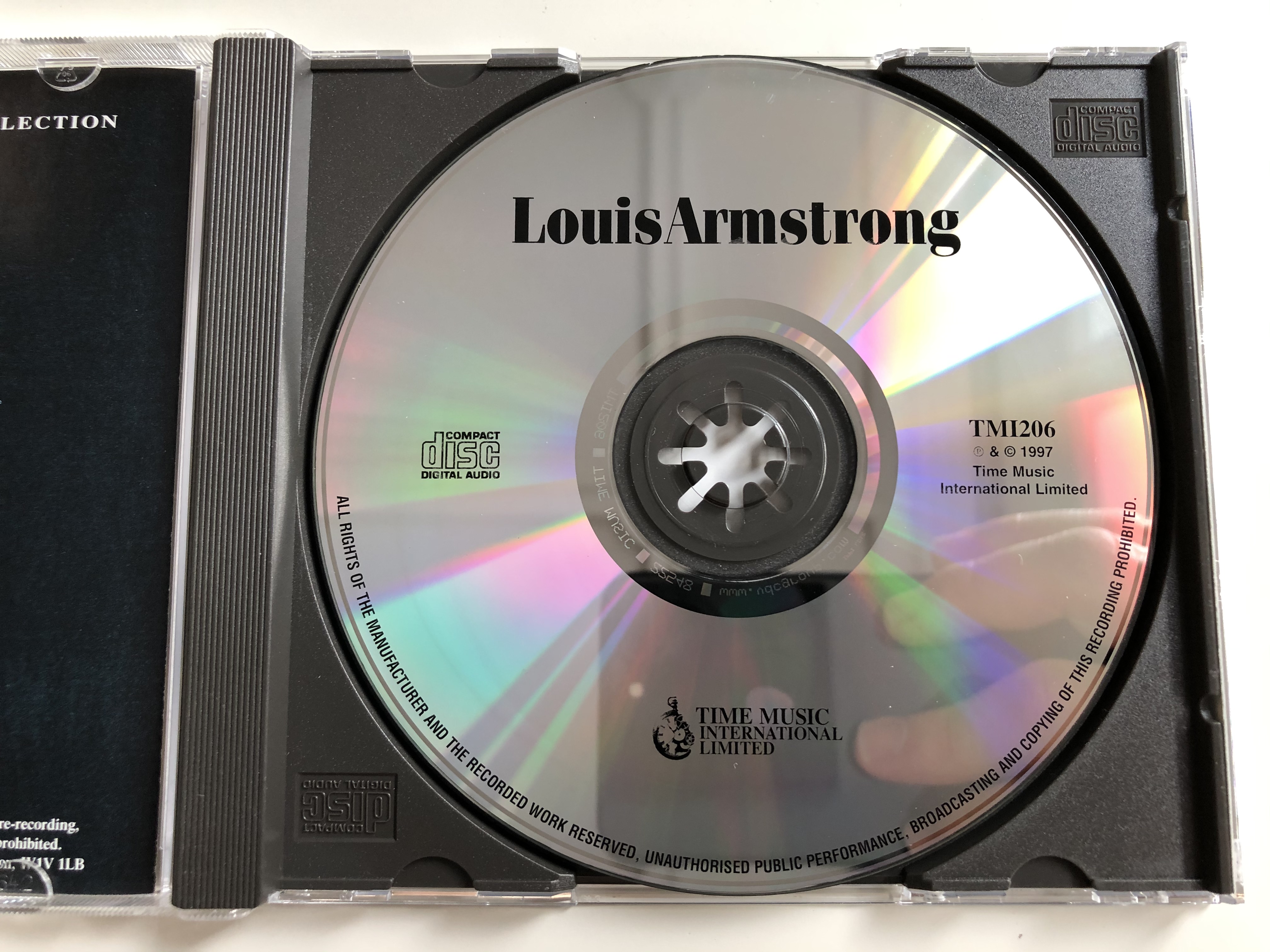 louis-armstrong-featuring-i-ve-got-the-world-on-a-string-basin-street-blues-st-louis-blues-time-music-international-limited-audio-cd-1997-tmi206-3-.jpg