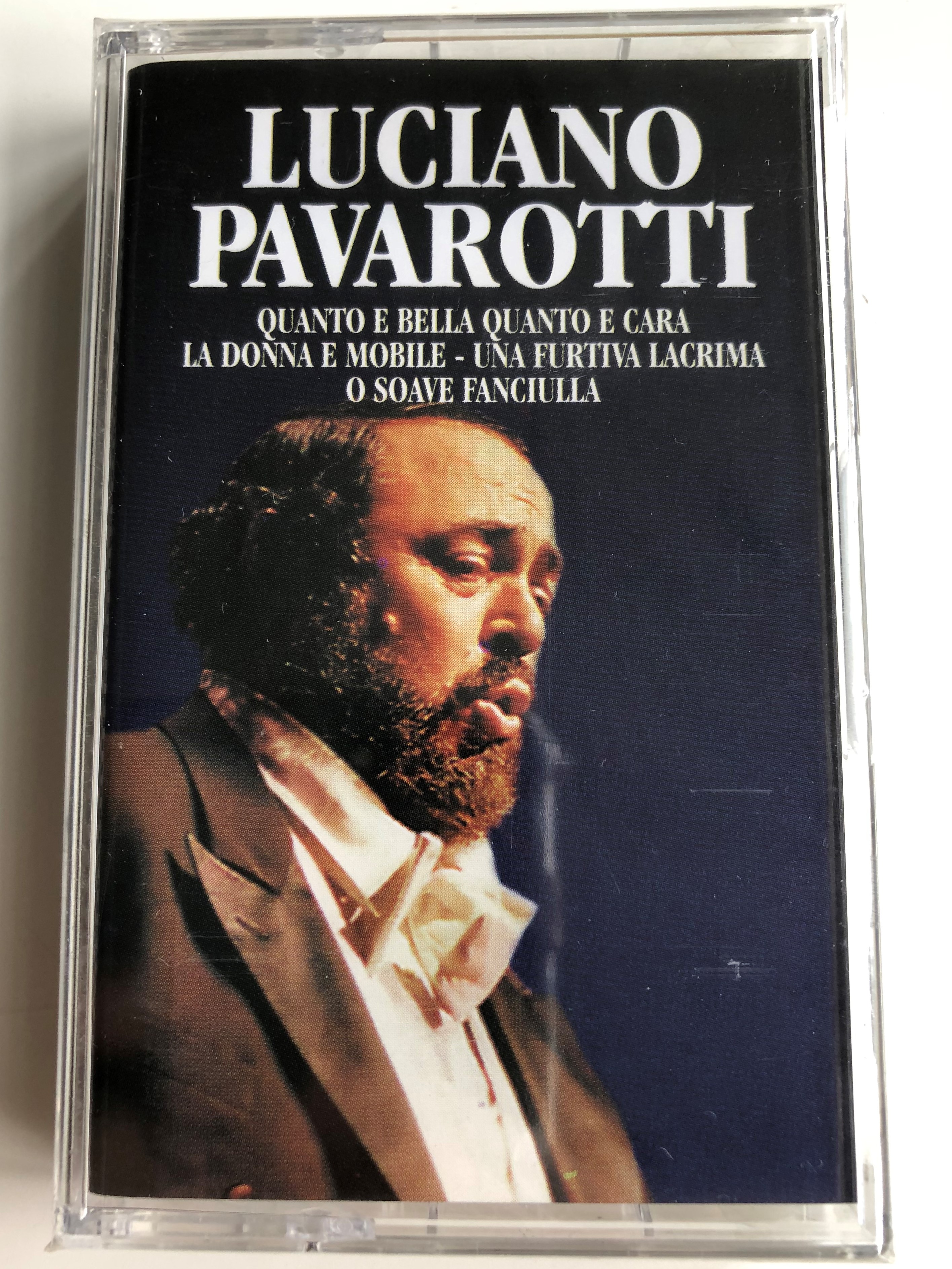 luciano-pavarotti-quanto-e-bella-quanto-e-cara-la-donna-e-mobile-une-furtiva-lacrima-o-soave-fanciulla-weton-wesgram-audio-cassette-rdmc016-1-.jpg