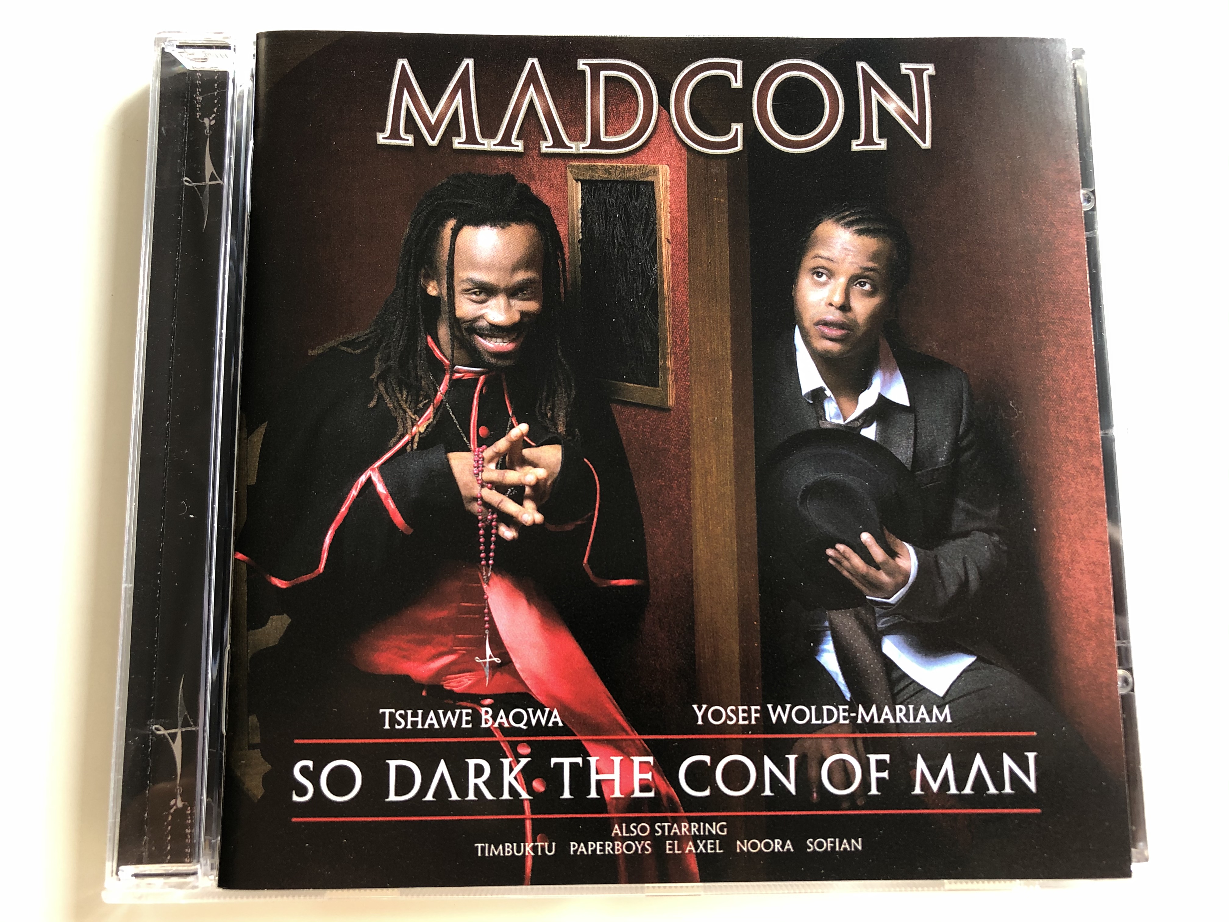 madcon-so-dark-the-con-of-man-tshawe-baqwa-yosef-wolde-mariam-also-starring-timbuktu-paperboys-el-axel-noora-sofian-bonnier-amigo-music-norway-as-audio-cd-2008-88697309002-1-.jpg