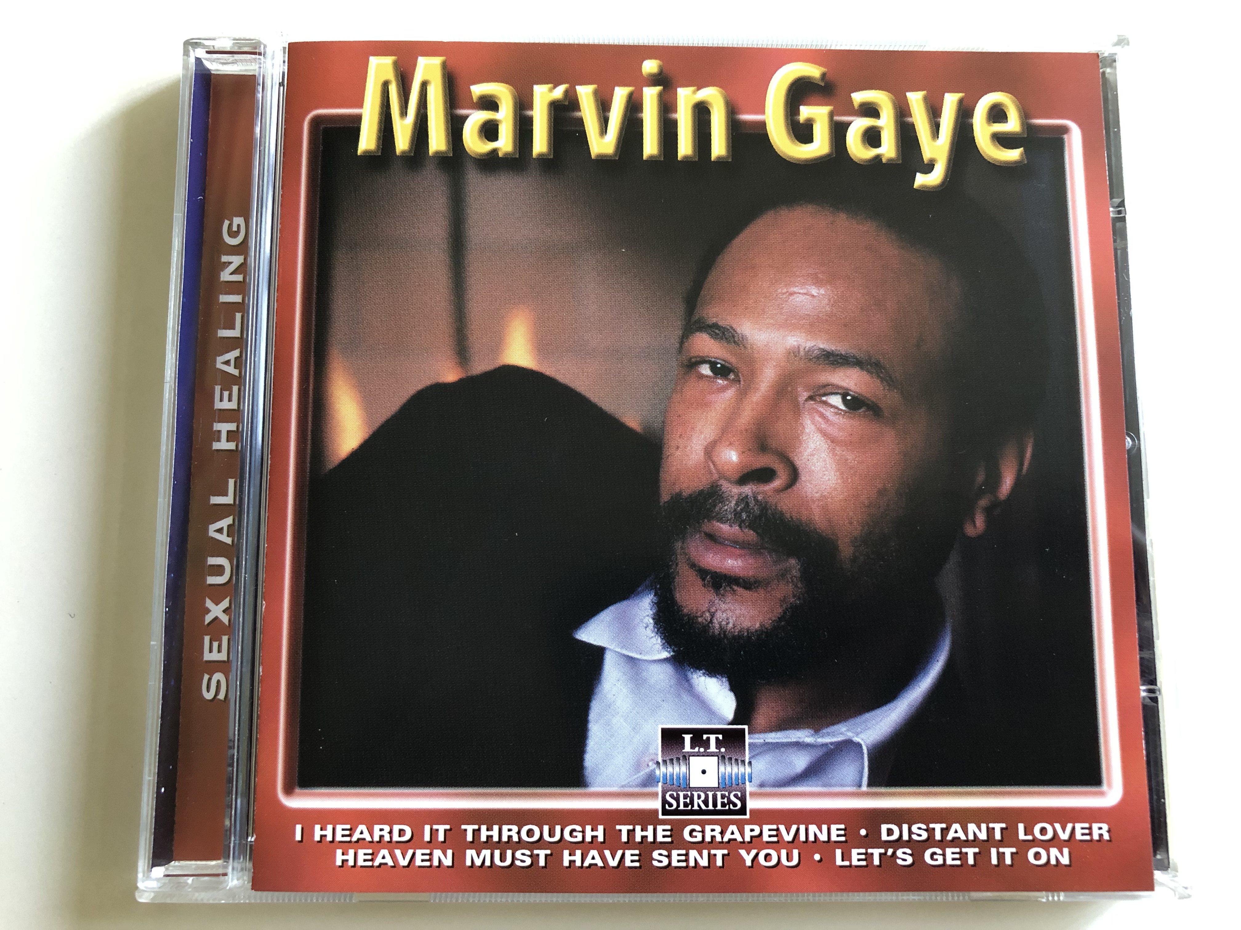 marvin-gaye-sexual-healing-i-heard-it-through-the-grapevine-distant-lover-heaven-must-have-sent-you-let-s-get-it-on-live-recording-audio-cd-lt-5013-1-.jpg