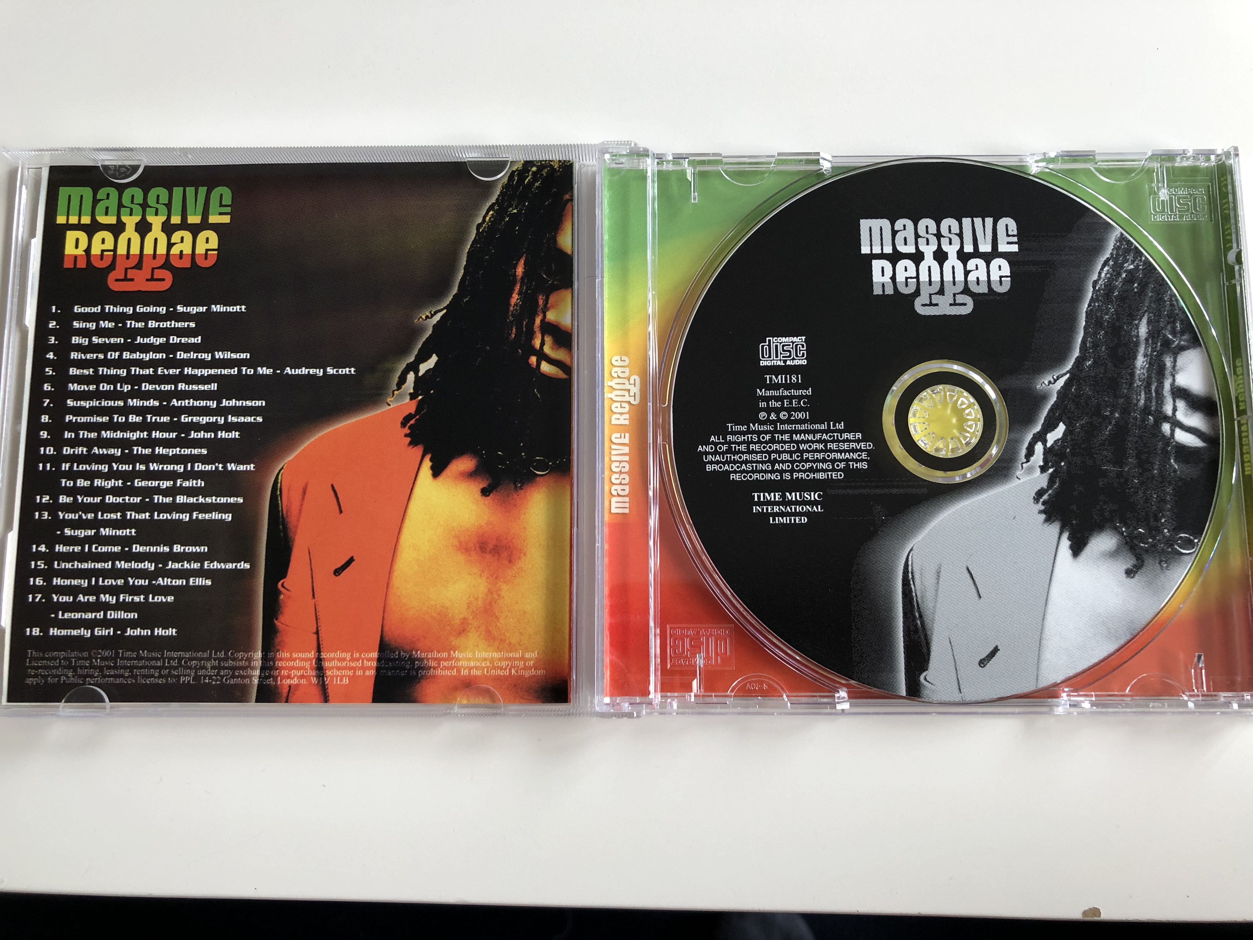 massive-reggae-the-definitive-collection-john-holt-sugar-minott-gregory-isaacs-dennis-brown-audio-cd-2001-time-music-2-.jpg