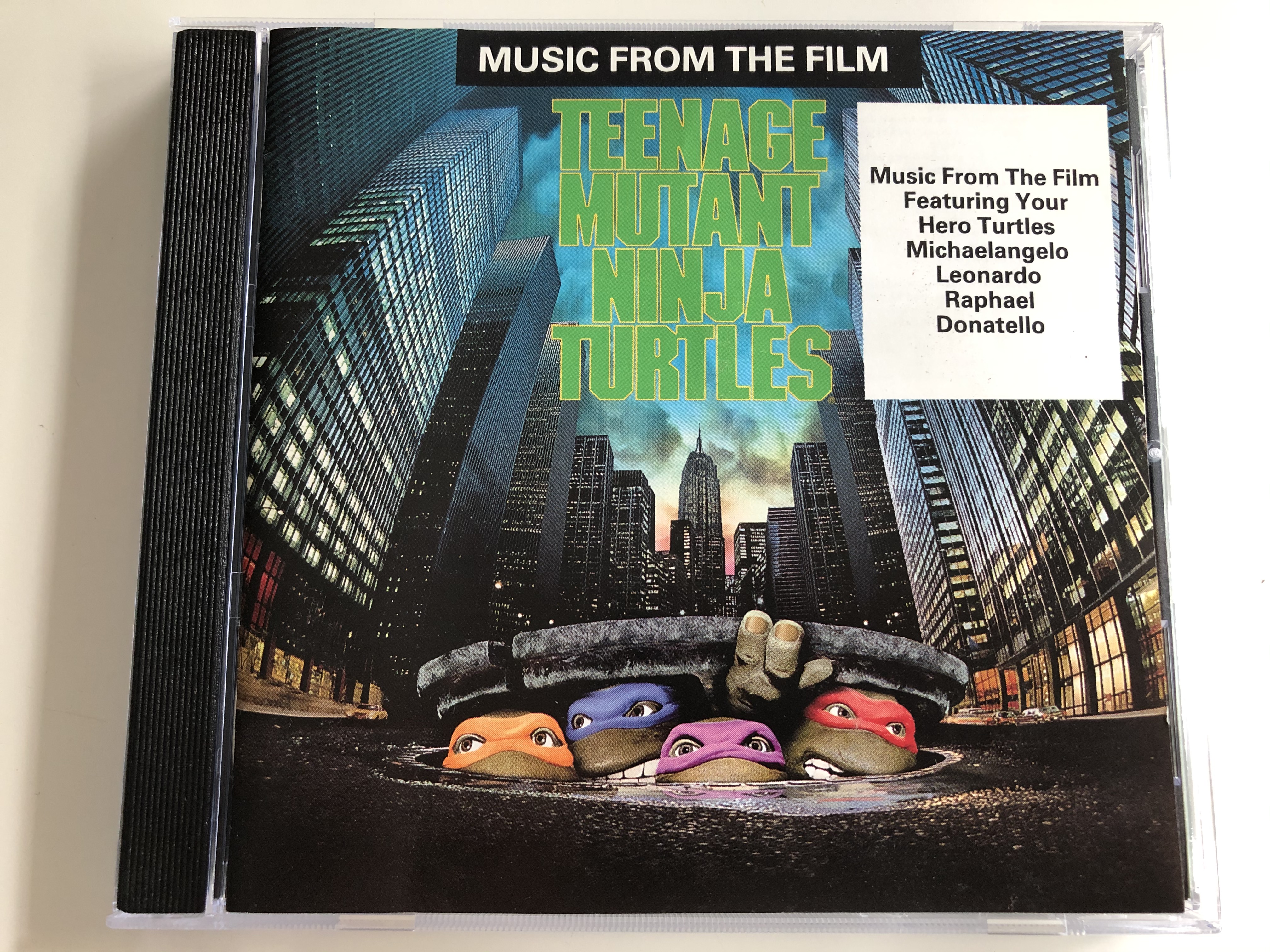 music-from-the-film-teenage-mutant-ninja-turtles-featuring-your-hero-turtles-michaelangelo-leonardo-raphael-donatello-sbk-records-audio-cd-1990-cdp-79-1066-2-1-.jpg