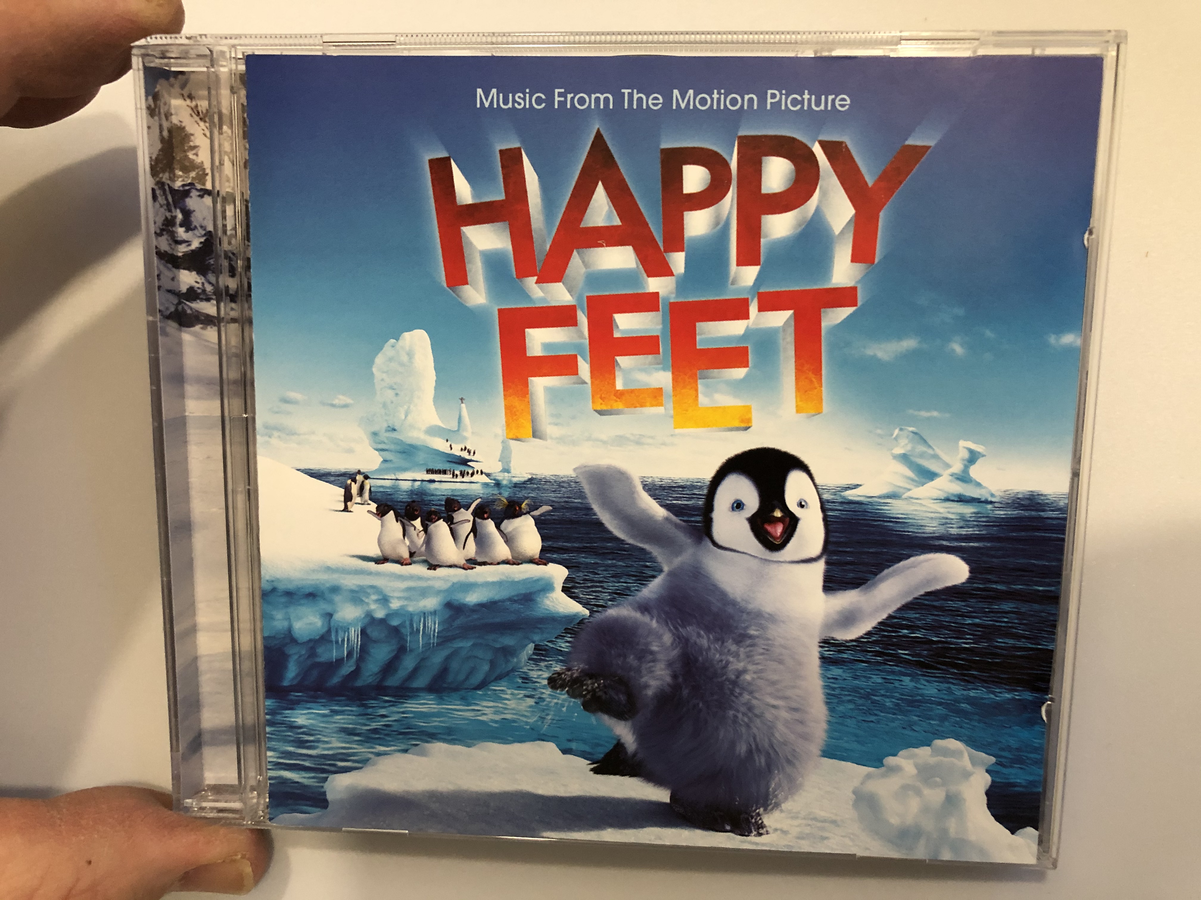 music-from-the-motion-picture-happy-feet-warner-music-group-audio-cd-2006-7567-83998-2-1-.jpg