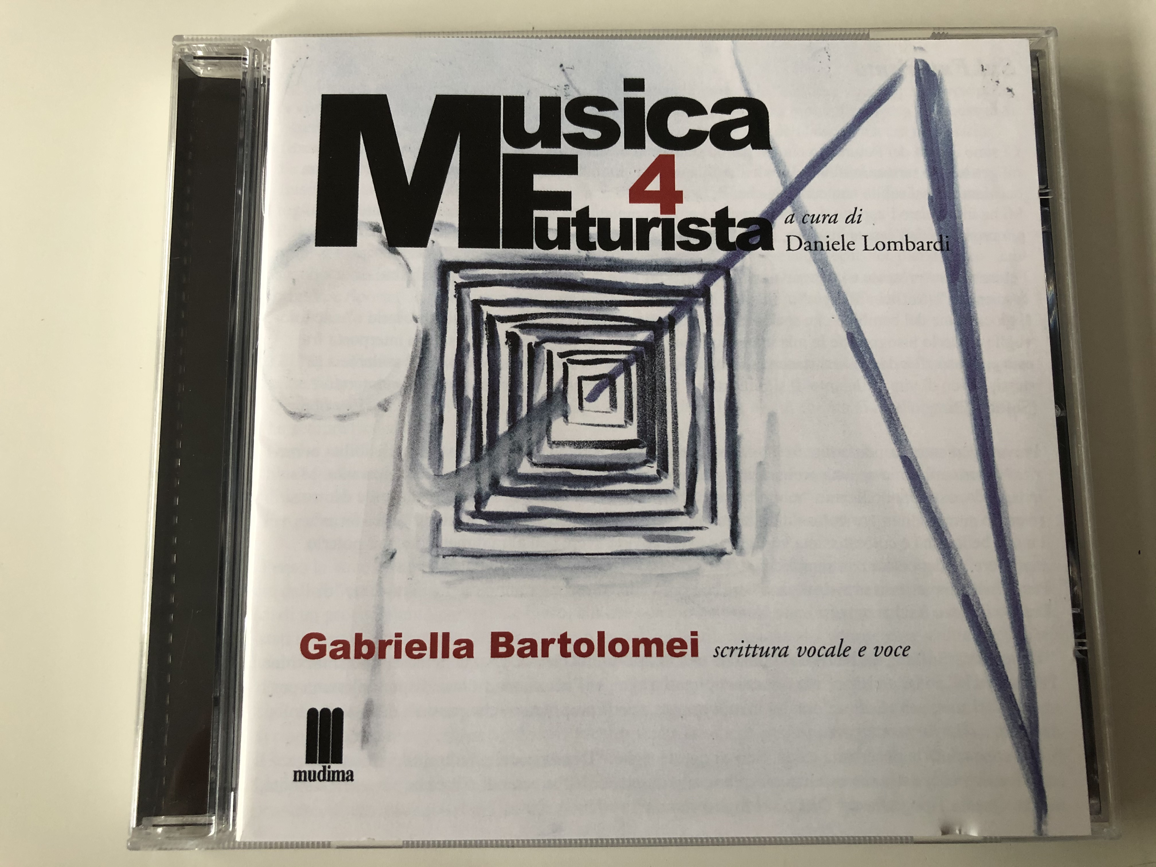 musica-futurista-4-a-cura-di-daniele-lombardi-gabriella-bartolomei-scrittura-vocale-e-voce-mudima-ed.-musicali-audio-cd-2010-8033224410296-1-.jpg