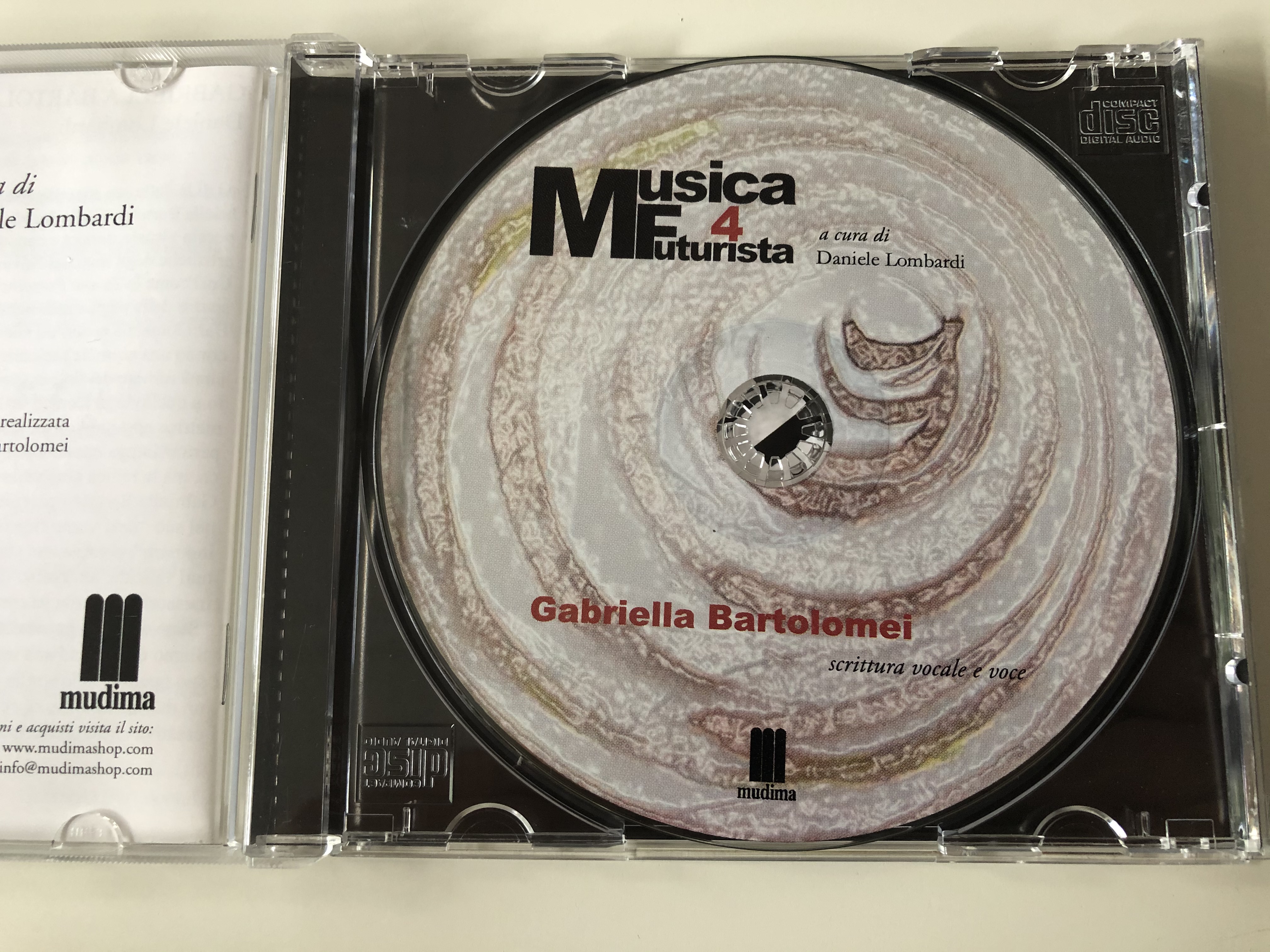 musica-futurista-4-a-cura-di-daniele-lombardi-gabriella-bartolomei-scrittura-vocale-e-voce-mudima-ed.-musicali-audio-cd-2010-8033224410296-12-.jpg