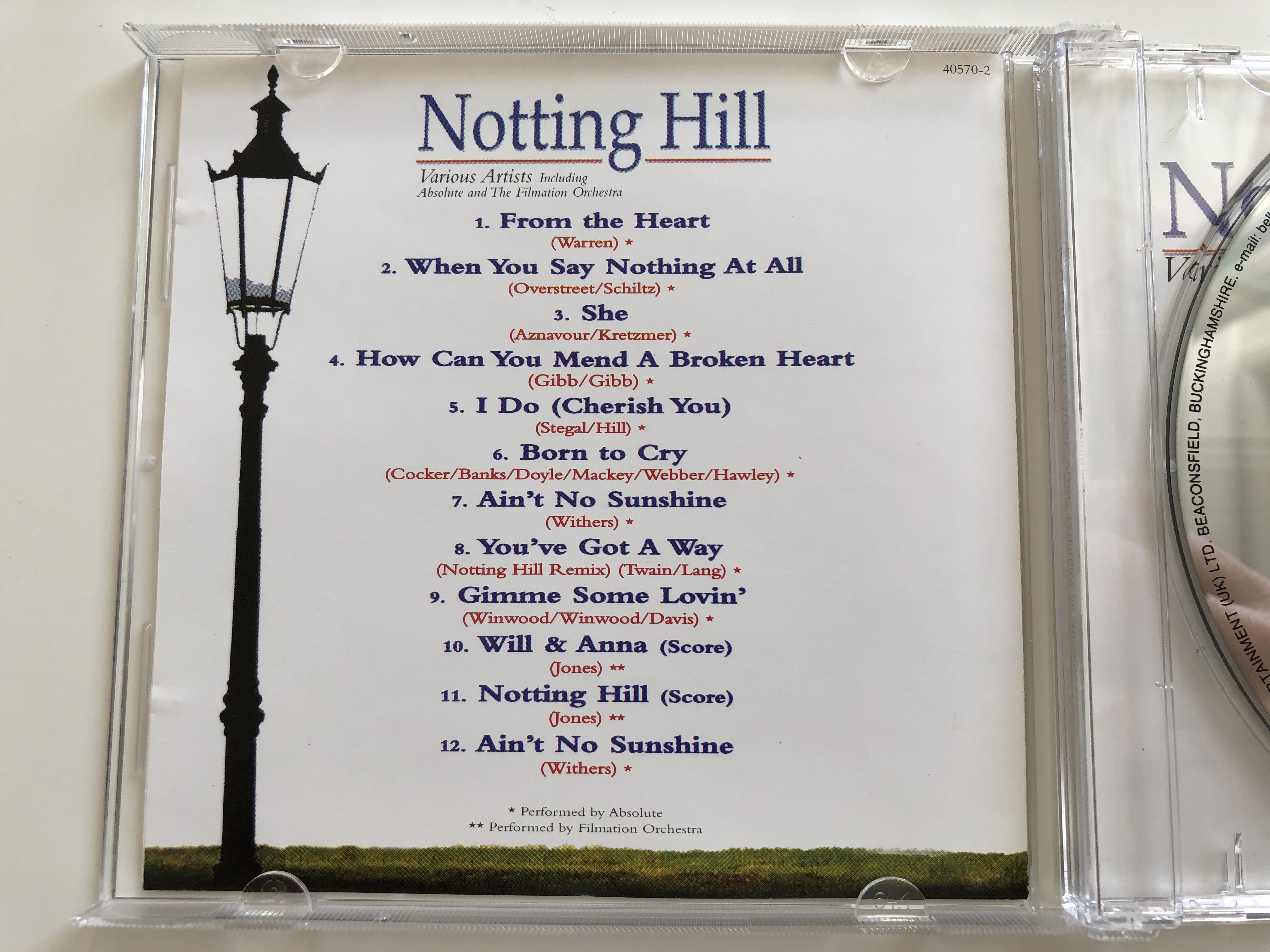 notting-hill-various-artists-including-absolute-and-the-filmation-orchestra-featuring-she-from-the-heart-how-can-you-mend-a-broken-heart-born-to-cry-nothing-hill-and-many-more-cosmopolit.jpg