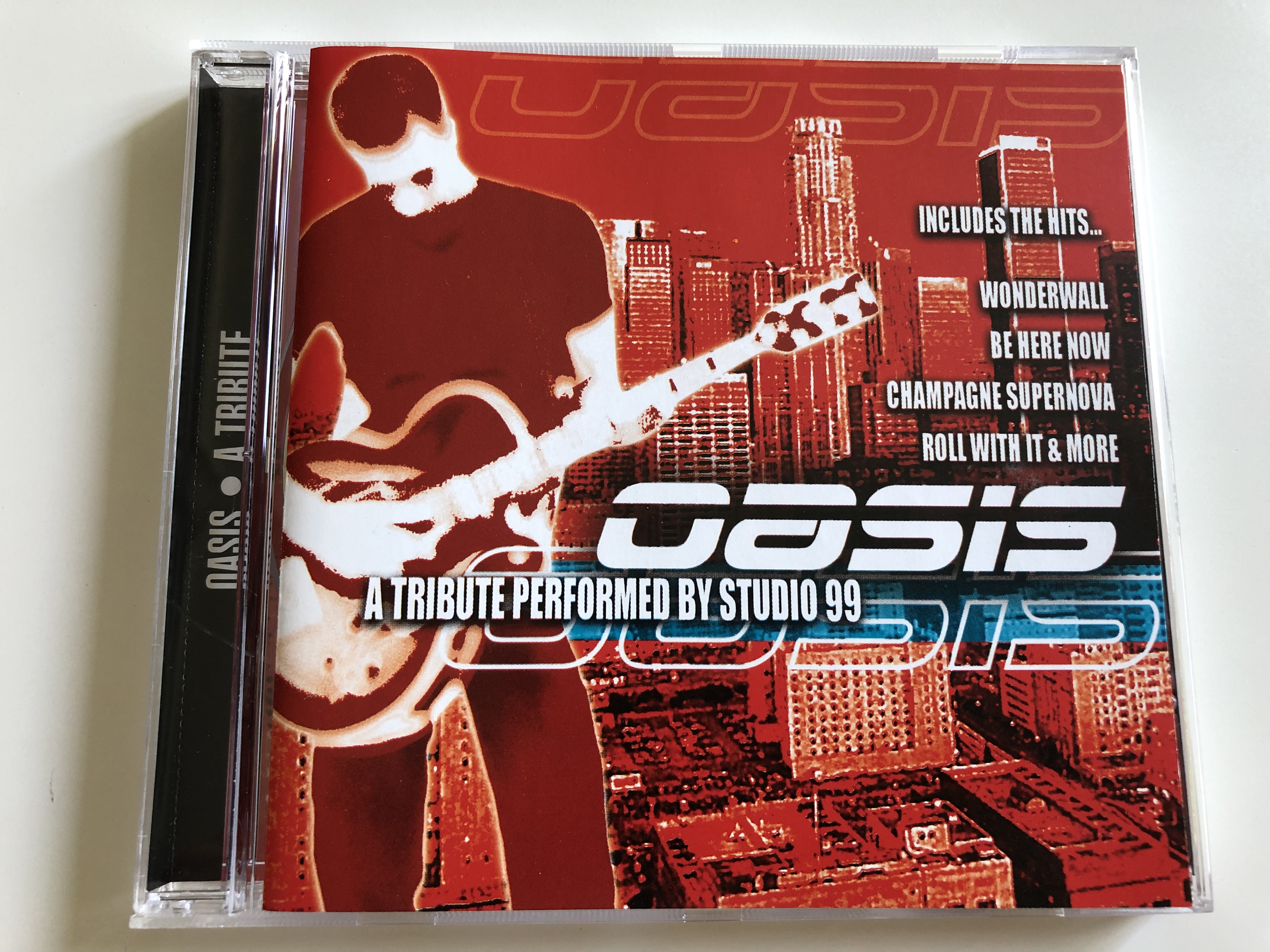 oasis-a-tribute-performed-by-studio-99-includes-the-hits...-wonderwall-be-here-now-champagne-supernova-roll-with-it-more-audio-cd-gfs530-1-.jpg