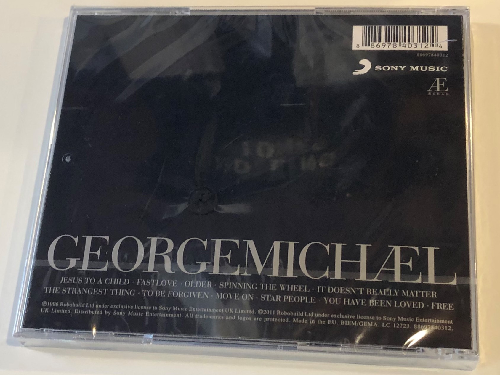 older-george-michael-sony-music-audio-cd-2011-88697840312-2-.jpg