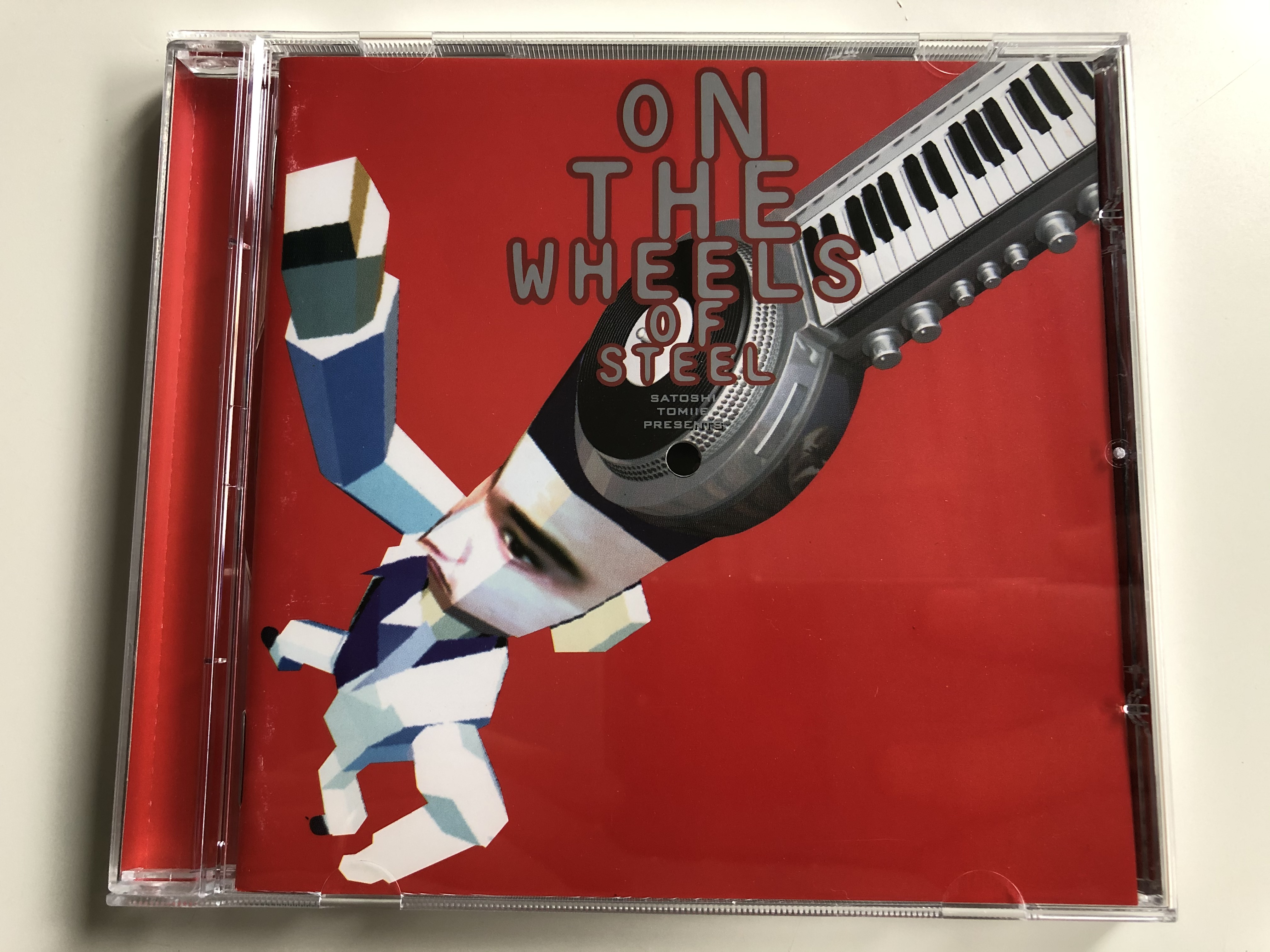 on-the-wheels-of-steel-satoshi-tomiie-dance-pool-audio-cd-1996-486834-2-1-.jpg