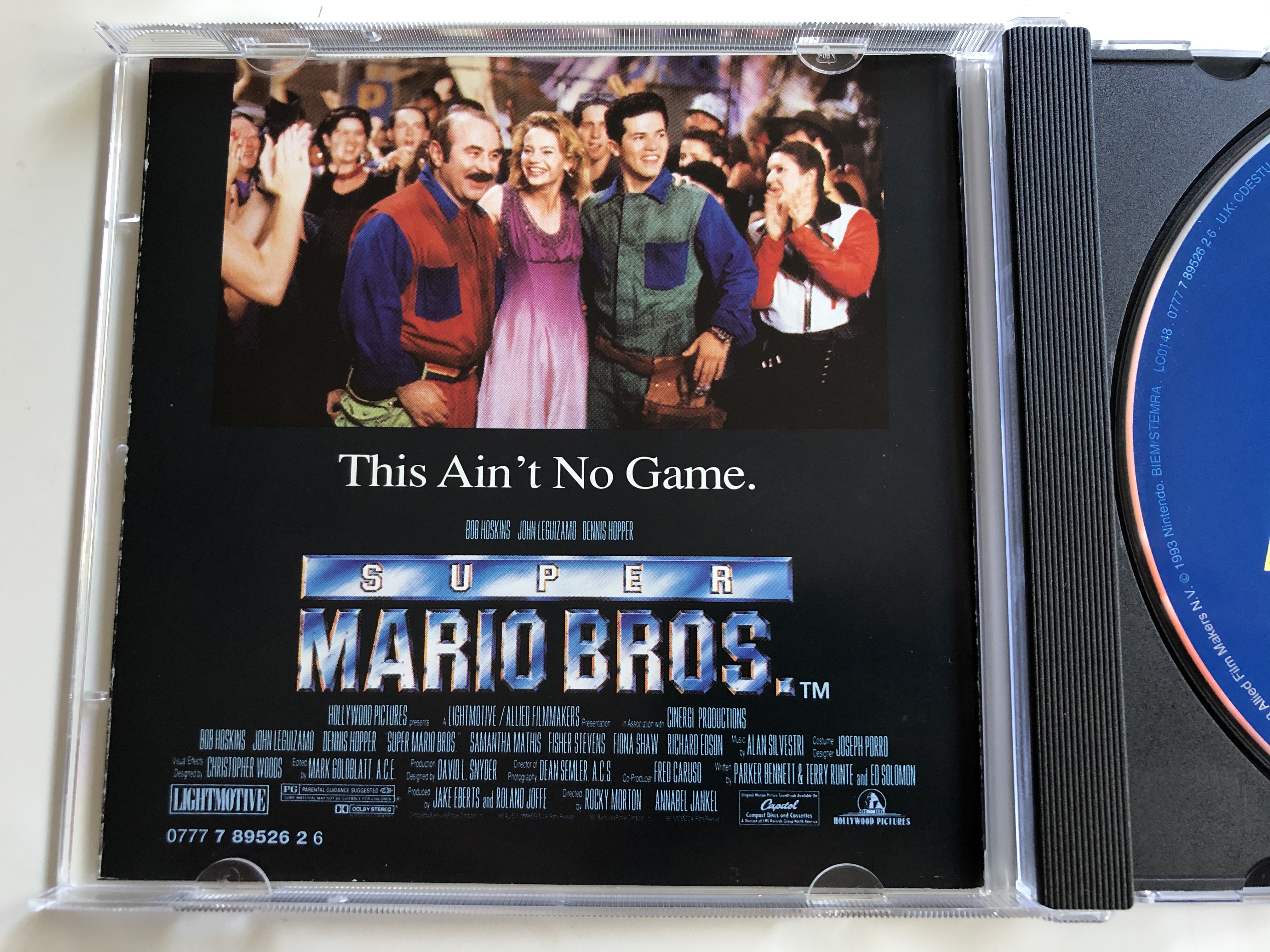 original-motion-picture-soundtrack-super-mario-bros.-featuring-music-from-roxette-extreme-divinlyls-megadeth-george-clinton-joe-satriani-queen-charles-eddie-marky-mark-us3-tracie-.jpg