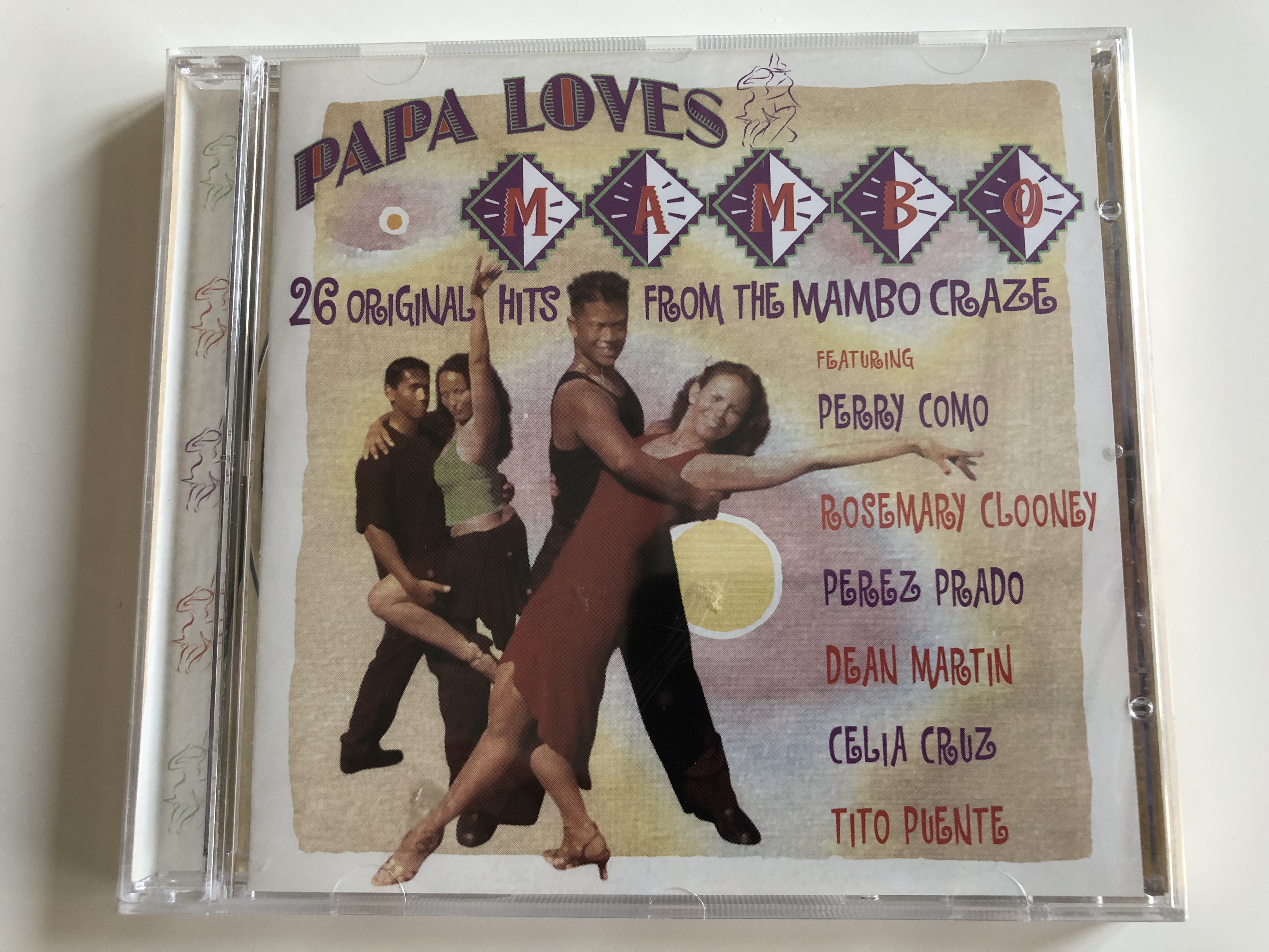 papa-loves-mambo-26-original-hits-from-the-mambo-craze-featuring-perry-como-rosemary-clooney-perez-prado-dean-martin-celia-cruz-tito-puente-audio-cd-2006-platcd-1335-1-.jpg