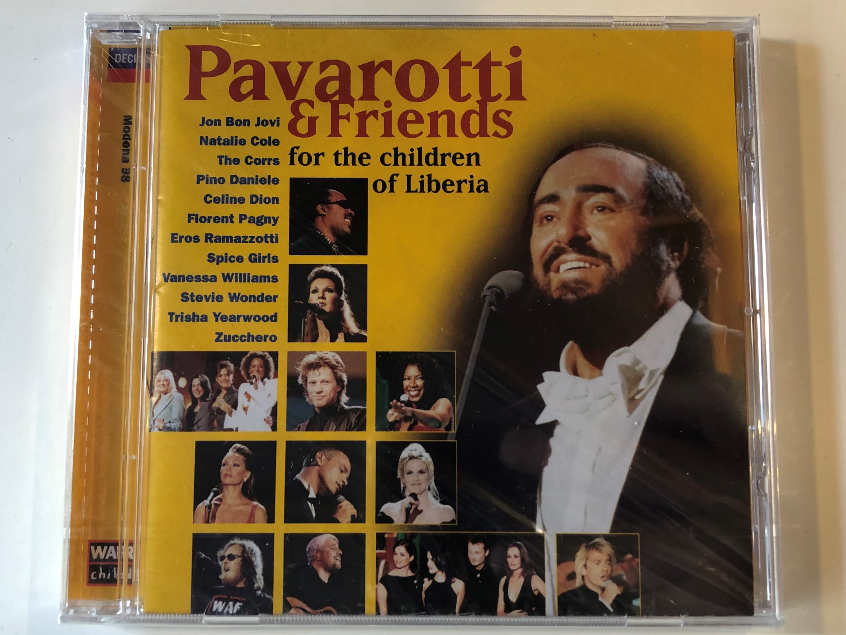 pavarotti-friends-for-the-children-of-liberia-jon-bon-jovi-natalie-cole-the-corrs-pino-daniele-celine-dion-florent-pagny-eros-ramazzotti-spice-girls-vanessa-williams-stevoie-wonder-t-1-.jpg