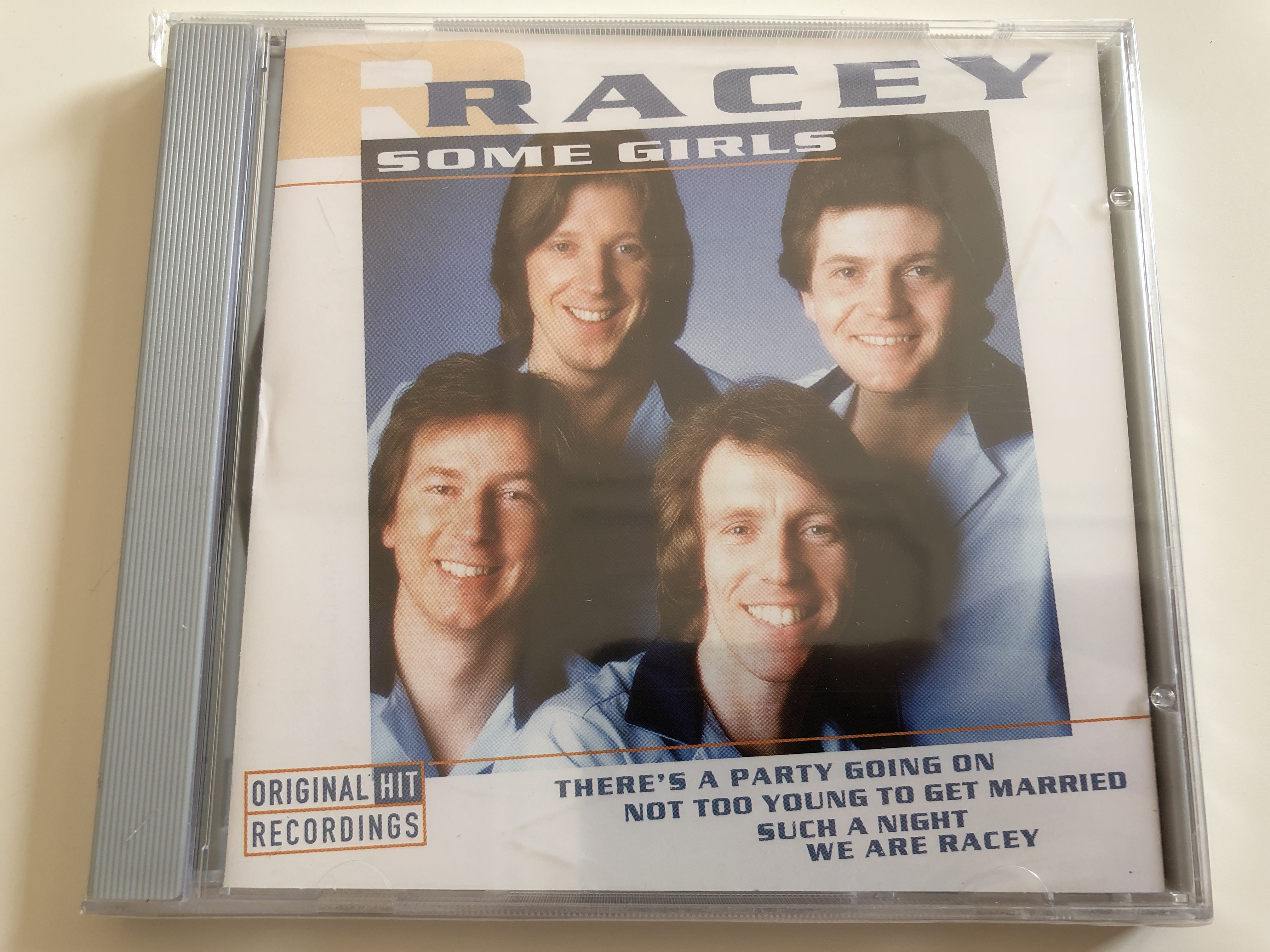 racey-some-girls-there-s-a-party-going-on-not-too-young-to-get-married-such-a-night-we-are-racey-wise-buy-audio-cd-1998-wb-885562-1-.jpg