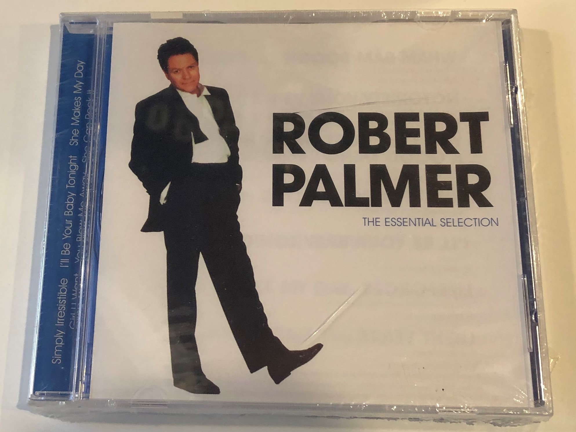 robert-palmer-the-essential-selection-simply-irresistible-i-ll-be-your-baby-tonight-she-makes-my-day-girl-u-want-you-blow-me-away-she-can-rock-it-disky-audio-cd-2000-si-997942-1-.jpg