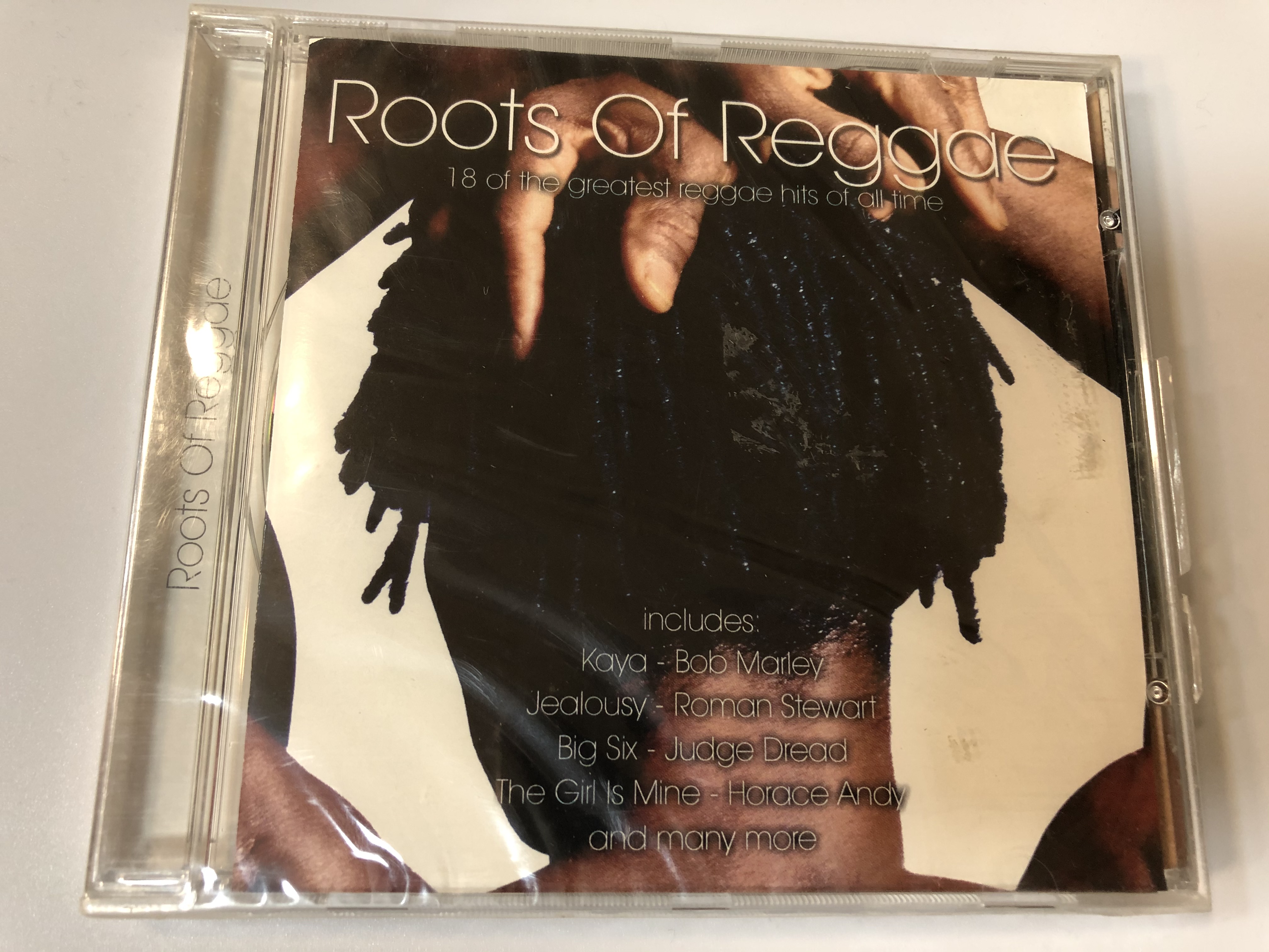 roots-of-reggae-18-of-the-greatest-reggae-hits-of-all-time-includes-kaya-bob-marley-jealousy-roman-stewart-big-six-judge-dread-the-girl-is-mine-horace-andy-and-many-more-time-mu-1-.jpg