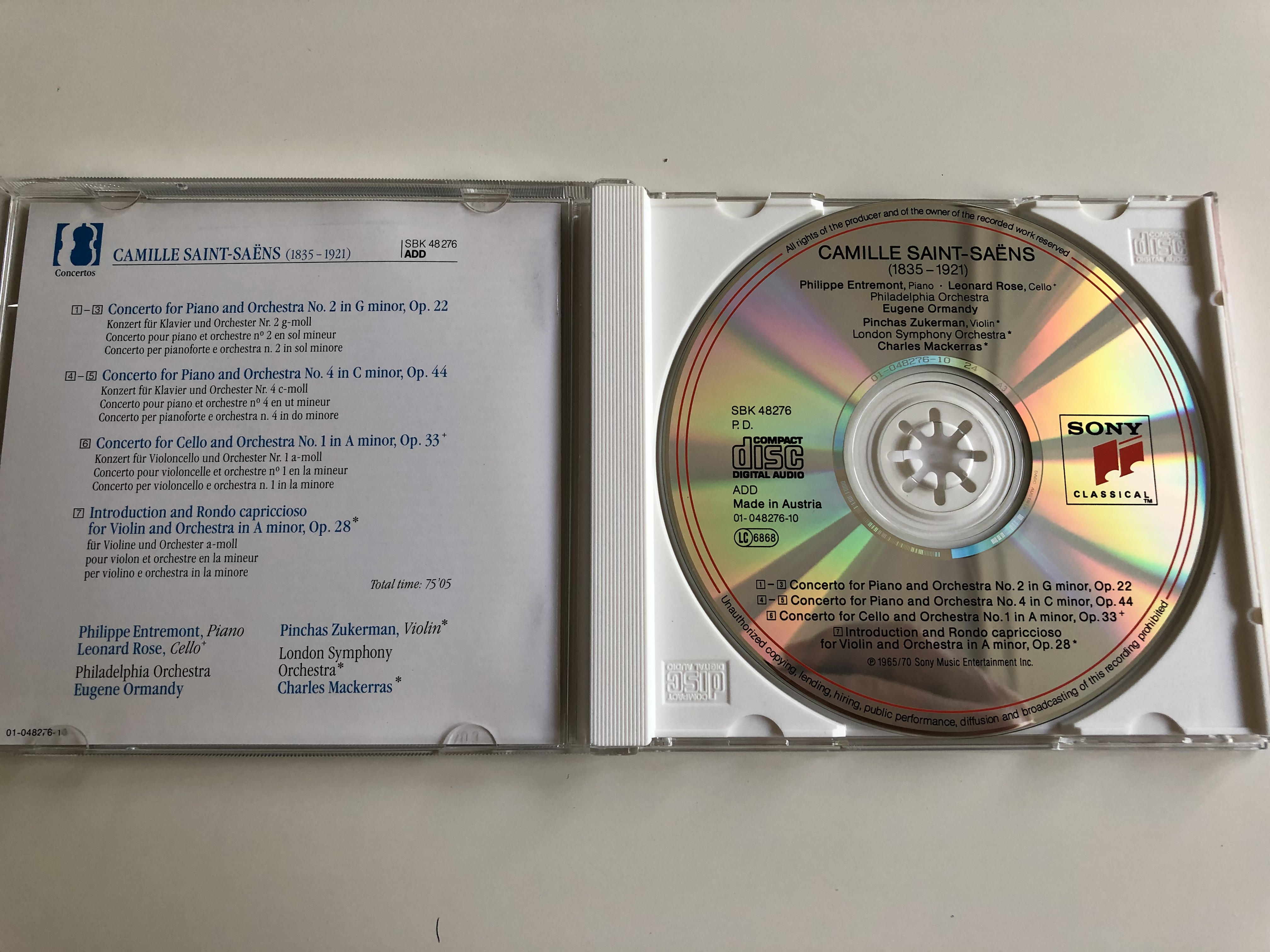 saint-saens-piano-concertos-no.-2-no.-4-cello-concerto-no.1-philippe-entremont-leonard-rose-philadelphia-orchestra-conducted-by-eugene-ormandy-audio-cd-1992-essential-classics-4-.jpg