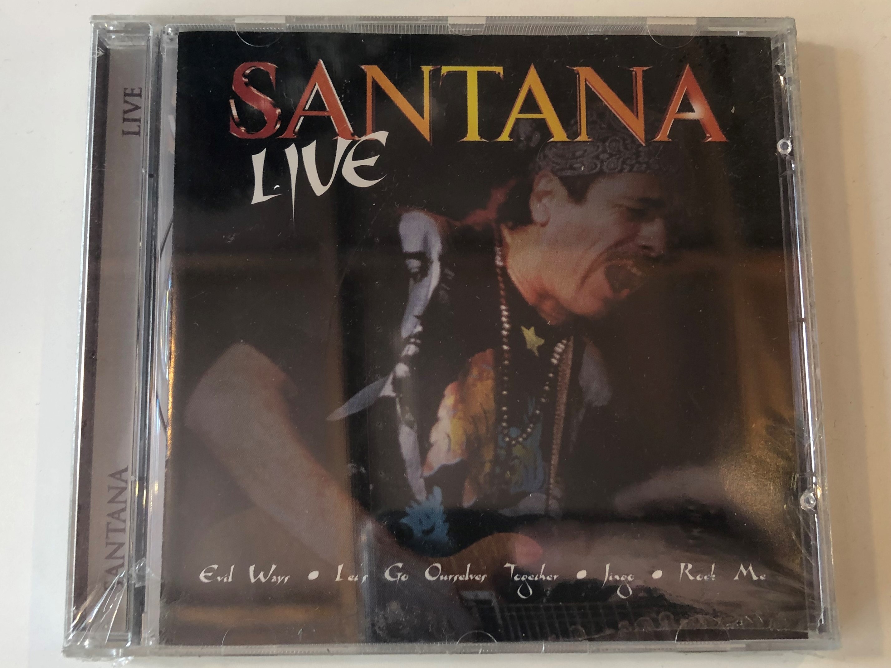 santana-live-evil-ways-let-s-go-ourselves-together-jingo-rock-me-a-play-collection-audio-cd-10118-2-1-.jpg