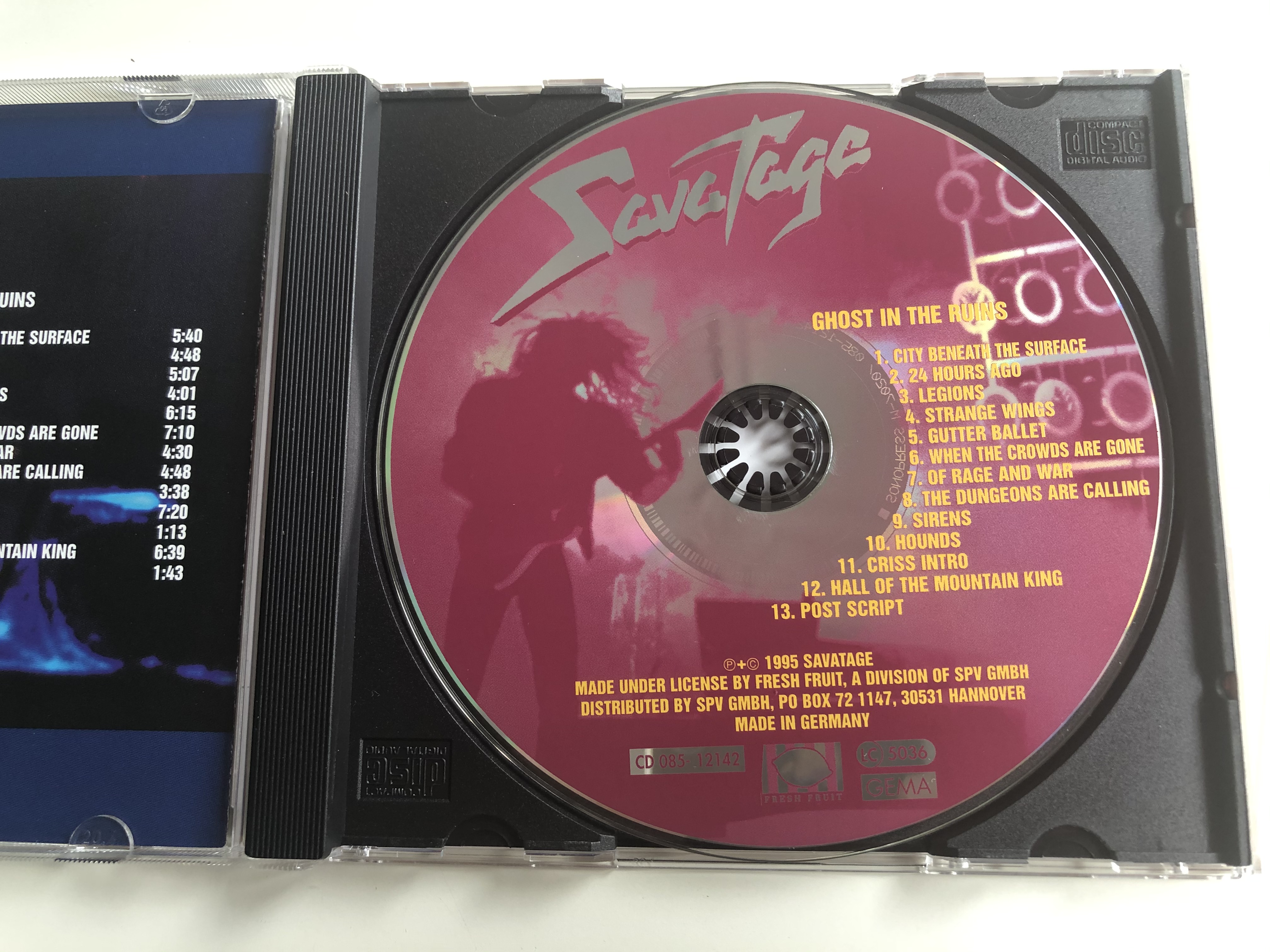 savatage-ghost-in-the-ruins-a-tribute-to-criss-oliva-fresh-fruit-audio-cd-1995-cd-085-12142-5-.jpg