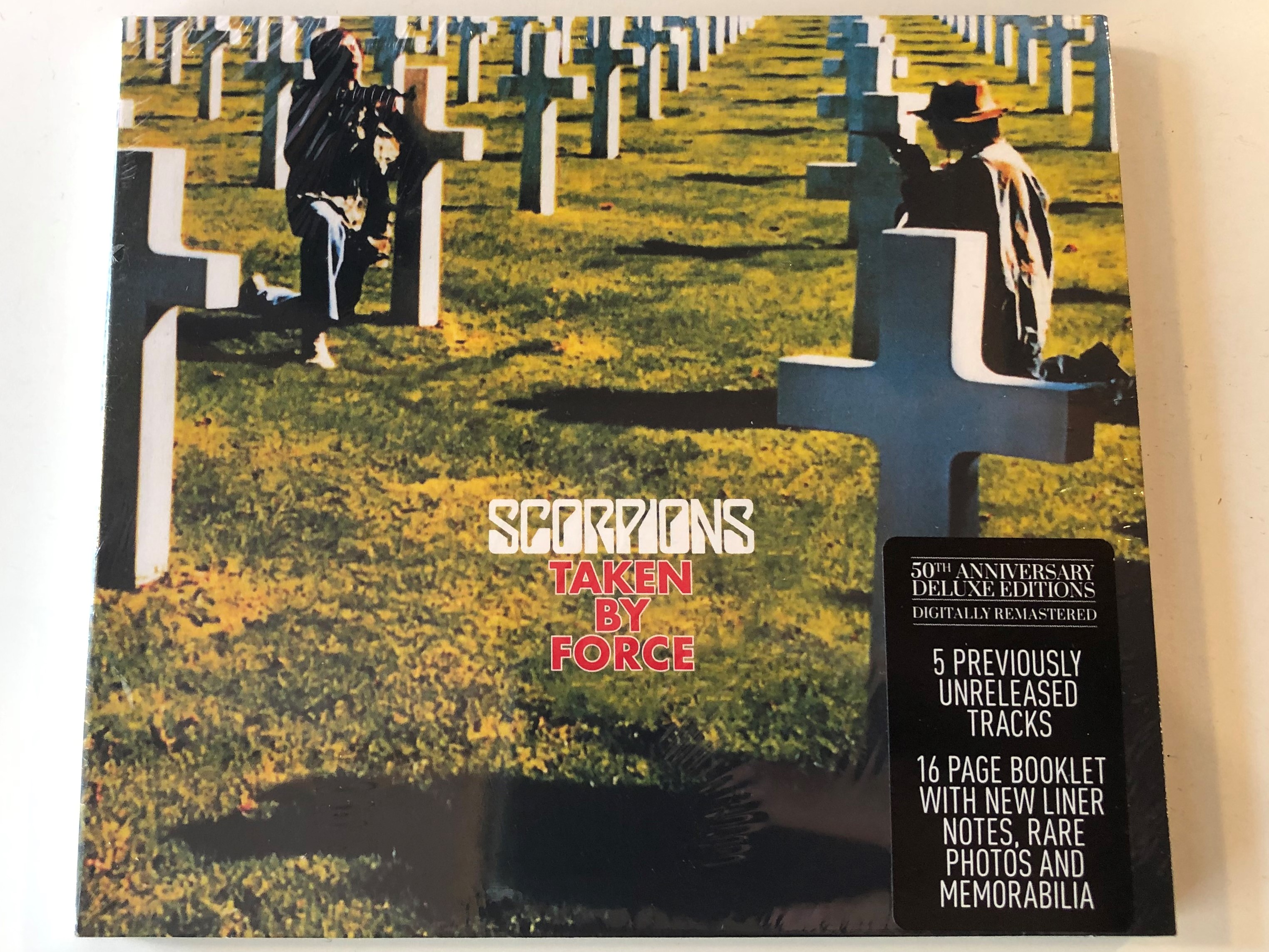 scorpions-taken-by-force-50th-anniversary-deluxe-editions-5-previously-unreleased-tracks-16-page-booklet-with-new-liner-notes-rare-photos-and-memorabilia-bmg-audio-cd-2015-4050538159479-1-.jpg