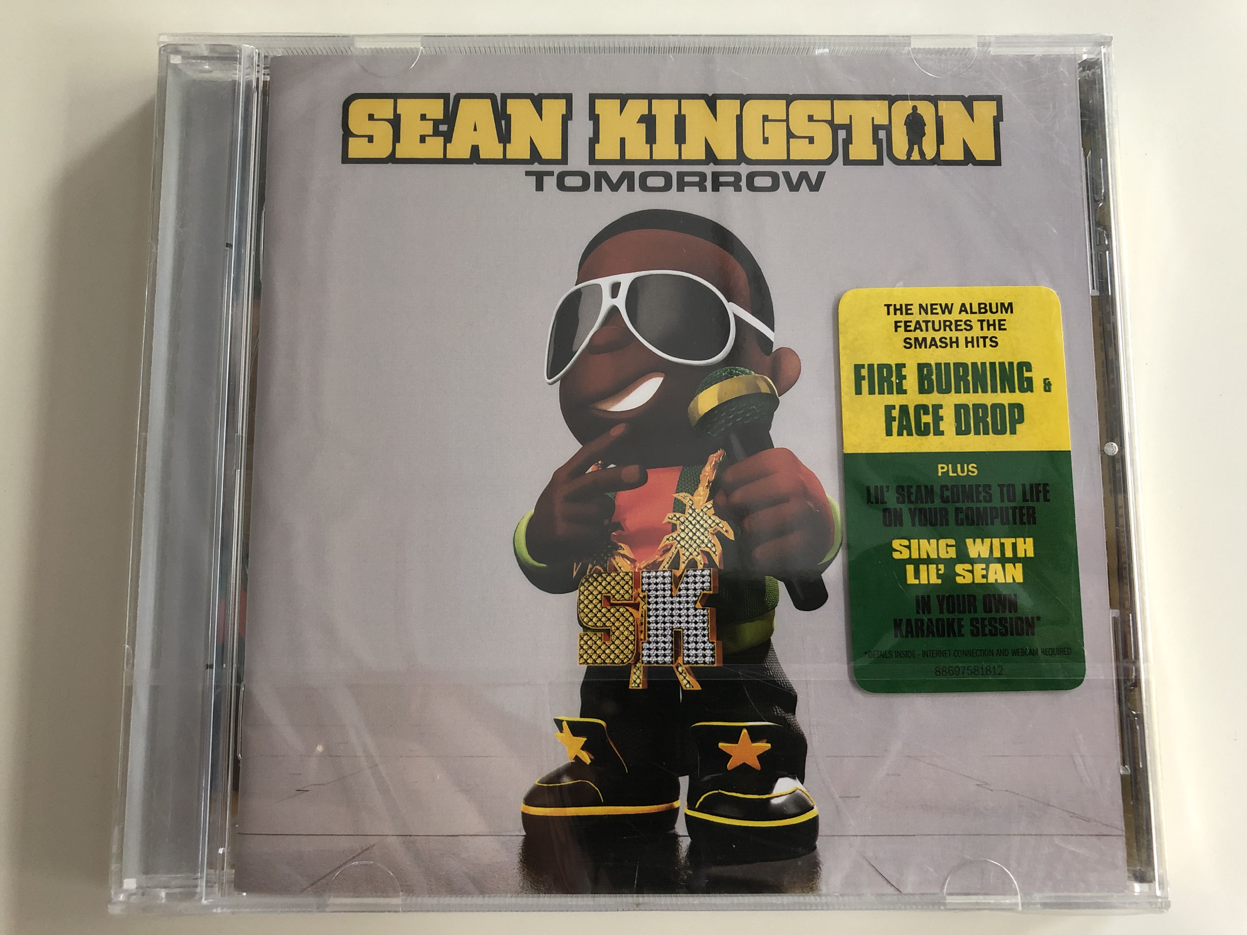 sean-kingston-tomorrow-the-new-album-features-the-smash-hits-fire-burning-face-drop-plus-lil-sean-comes-to-life-on-your-computer.-sing-with-lil-sean-in-your-own-karaoke-session-epic-au-1-.jpg