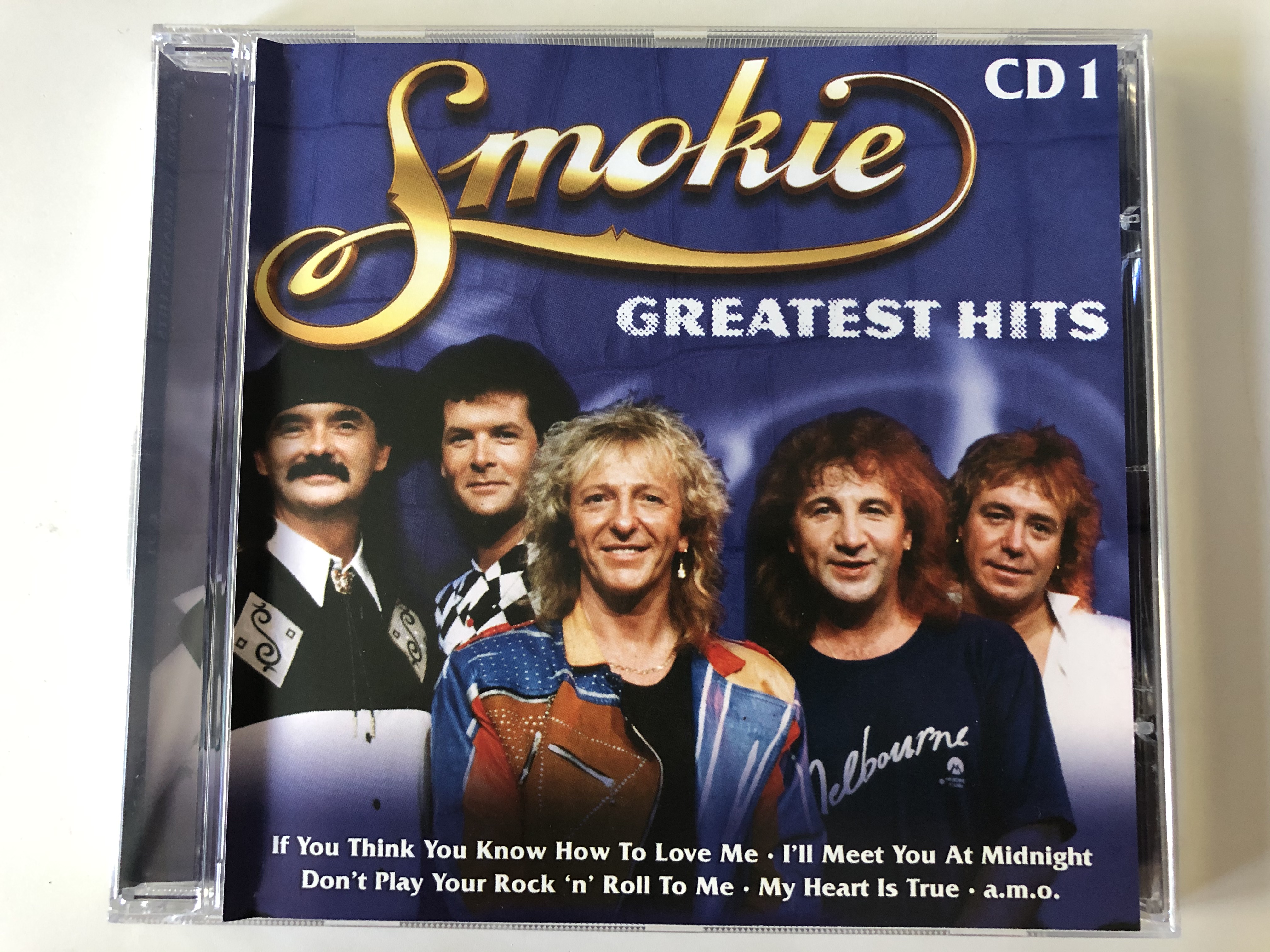 smokie-greatest-hits-cd-1-if-you-think-you-know-how-to-love-me-i-ll-meet-you-at-midnight-don-t-play-your-rock-n-roll-to-me-my-heart-is-true-a.m.o.-eurotrend-audio-cd-cd-141-1-.jpg