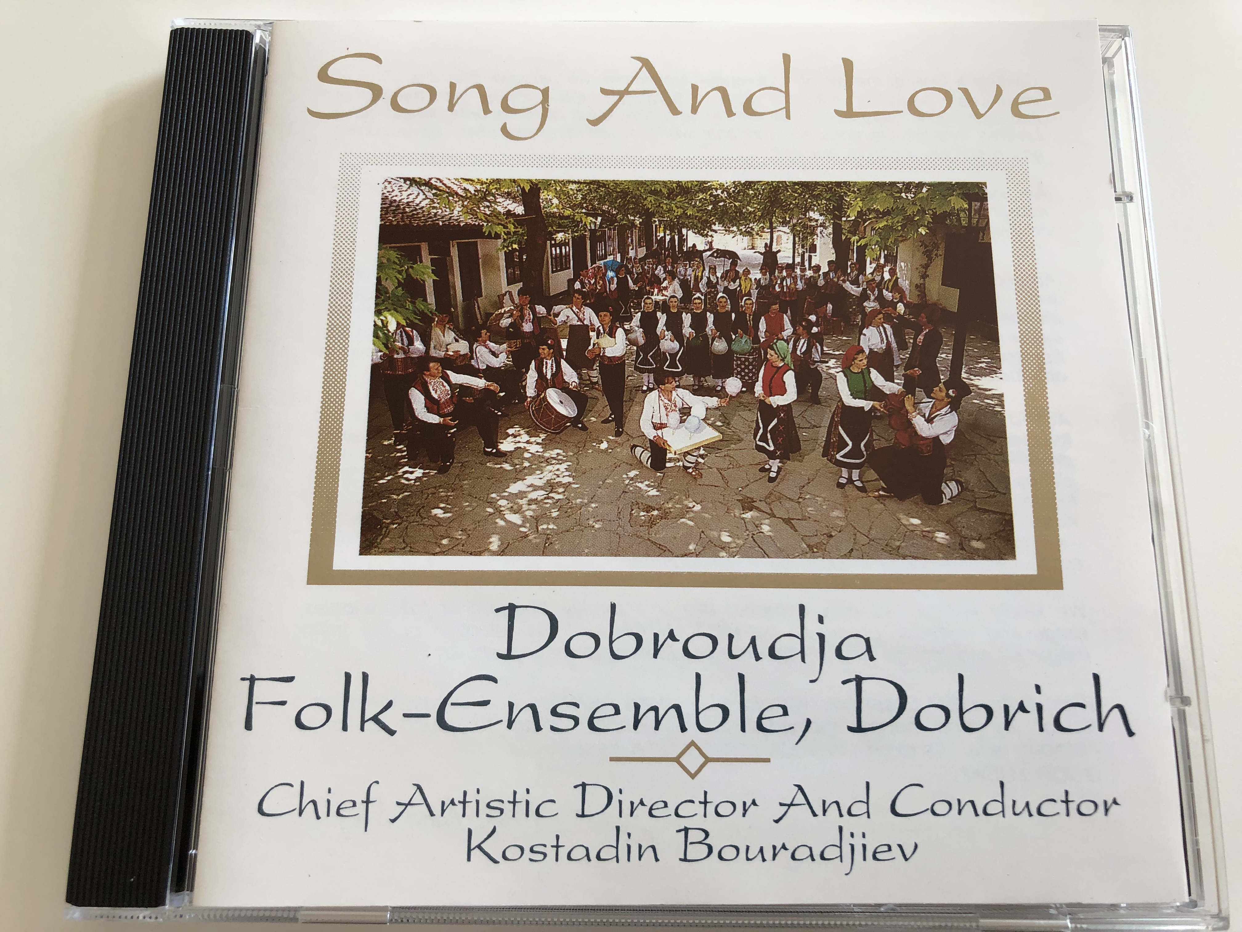 song-and-love-dobroudja-folk-ensemble-dobrich-chief-artistic-director-and-conductor-konstadin-bouradjiev-audio-cd-stereo-060155-1-.jpg