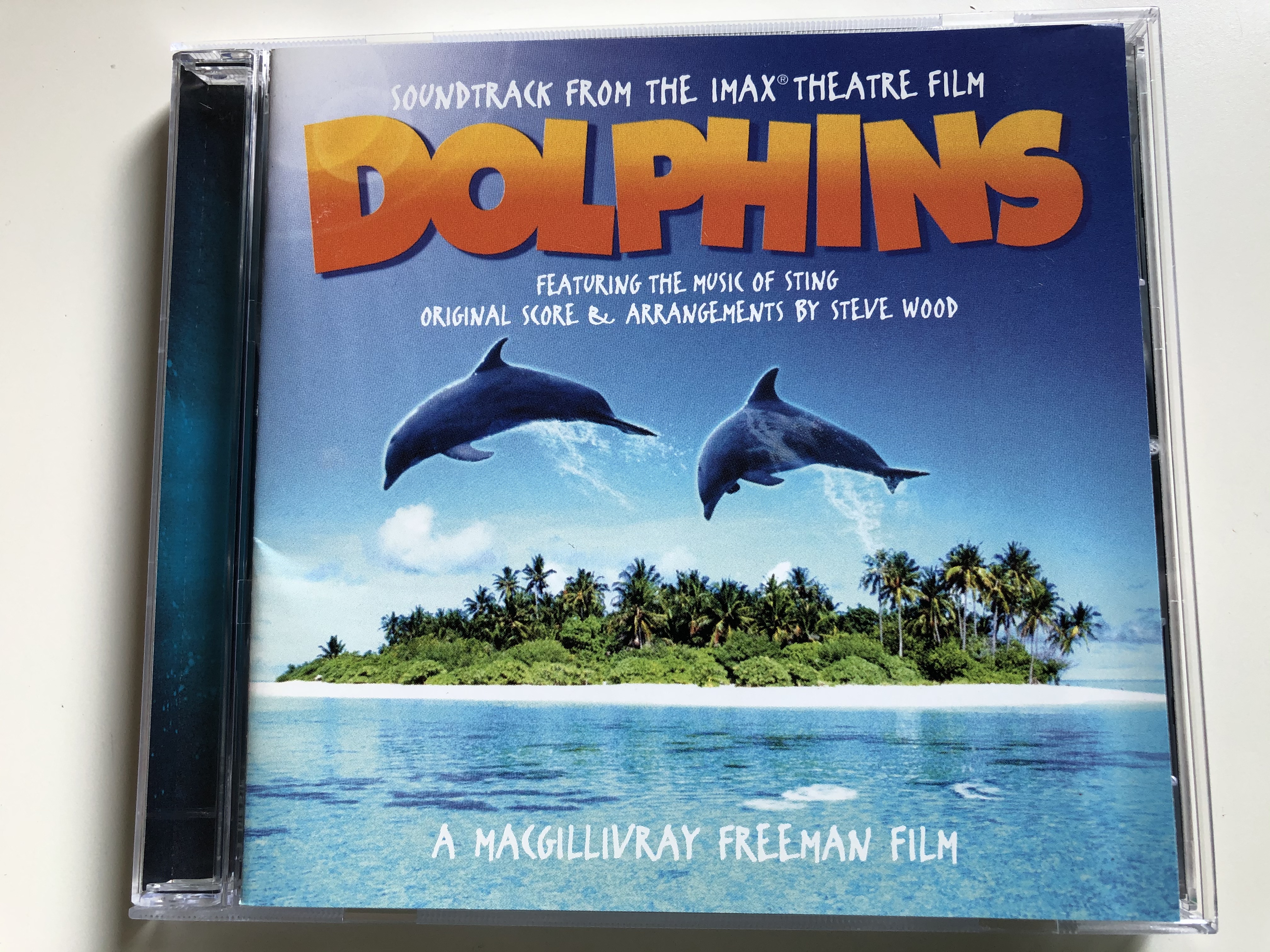 soundtrack-from-the-imax-theatre-film-dolphins-featuring-the-music-of-sting-original-score-arrangements-by-steve-wood-a-macgillivray-freeman-film-pang-a-audio-cd-2000-159-145-2-1-.jpg