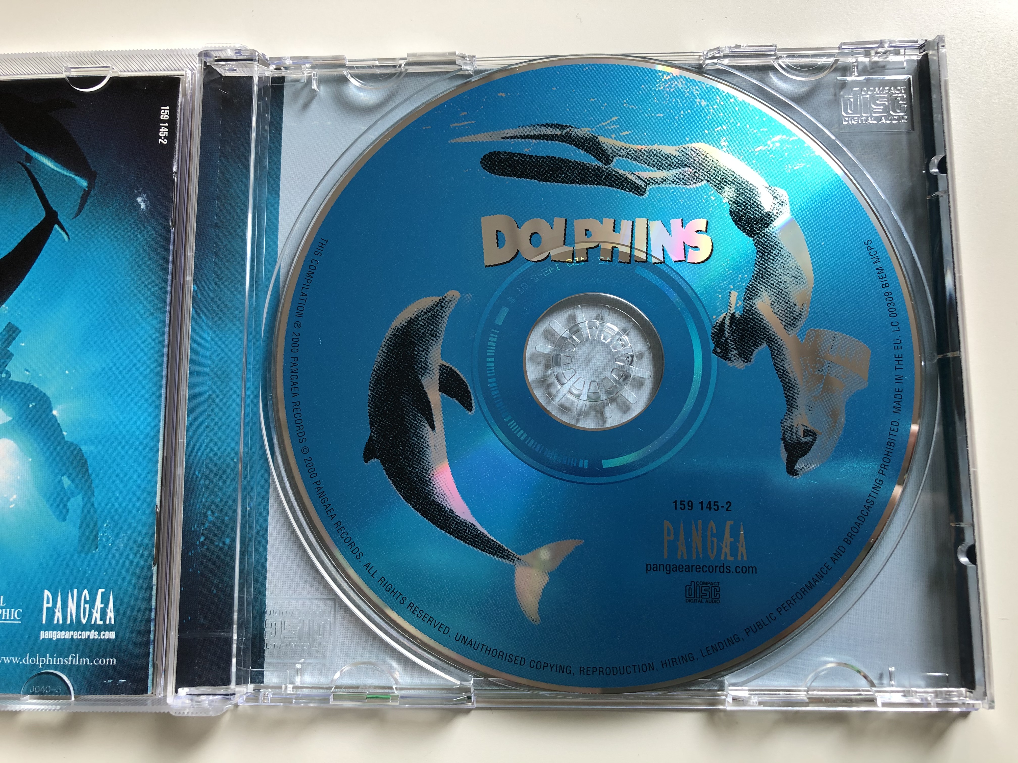 soundtrack-from-the-imax-theatre-film-dolphins-featuring-the-music-of-sting-original-score-arrangements-by-steve-wood-a-macgillivray-freeman-film-pang-a-audio-cd-2000-159-145-2-10-.jpg